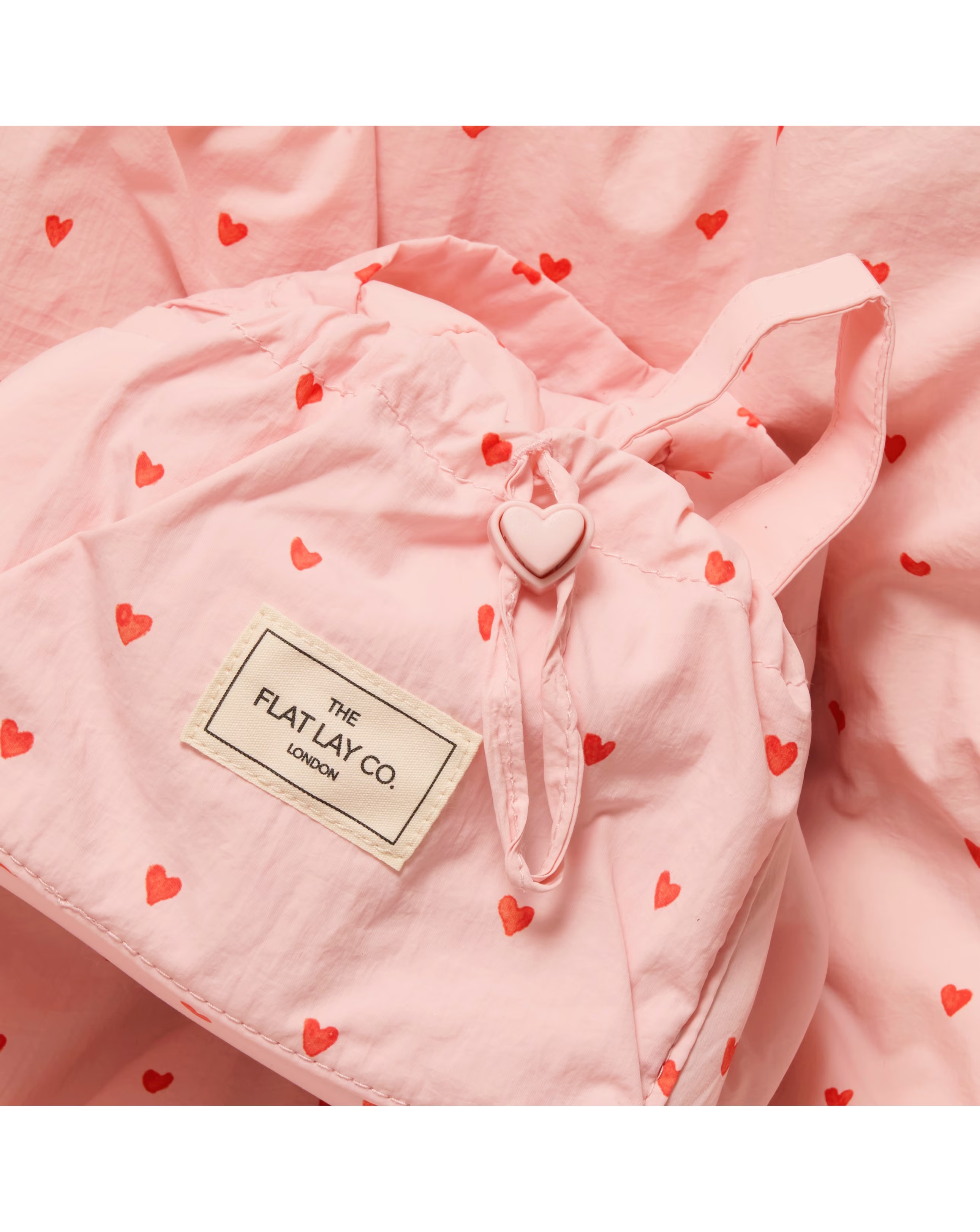 148691-the-flat-lay-co-marshmallow-drawstring-makeup-bag-in-pink-hearts-1.jpg