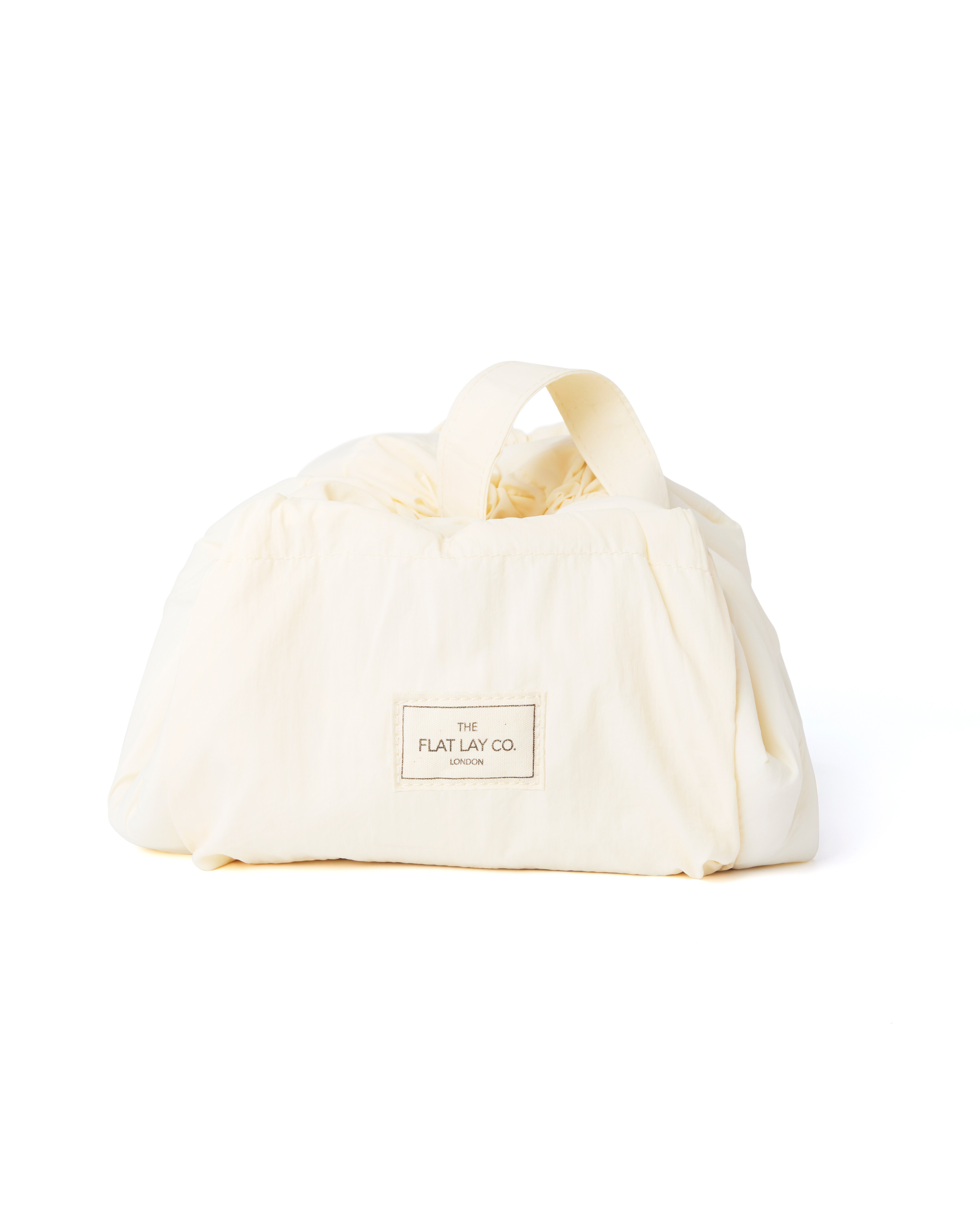 The Flat Lay Co.Marshmallow Drawstring Makeup Bag in Vanilla