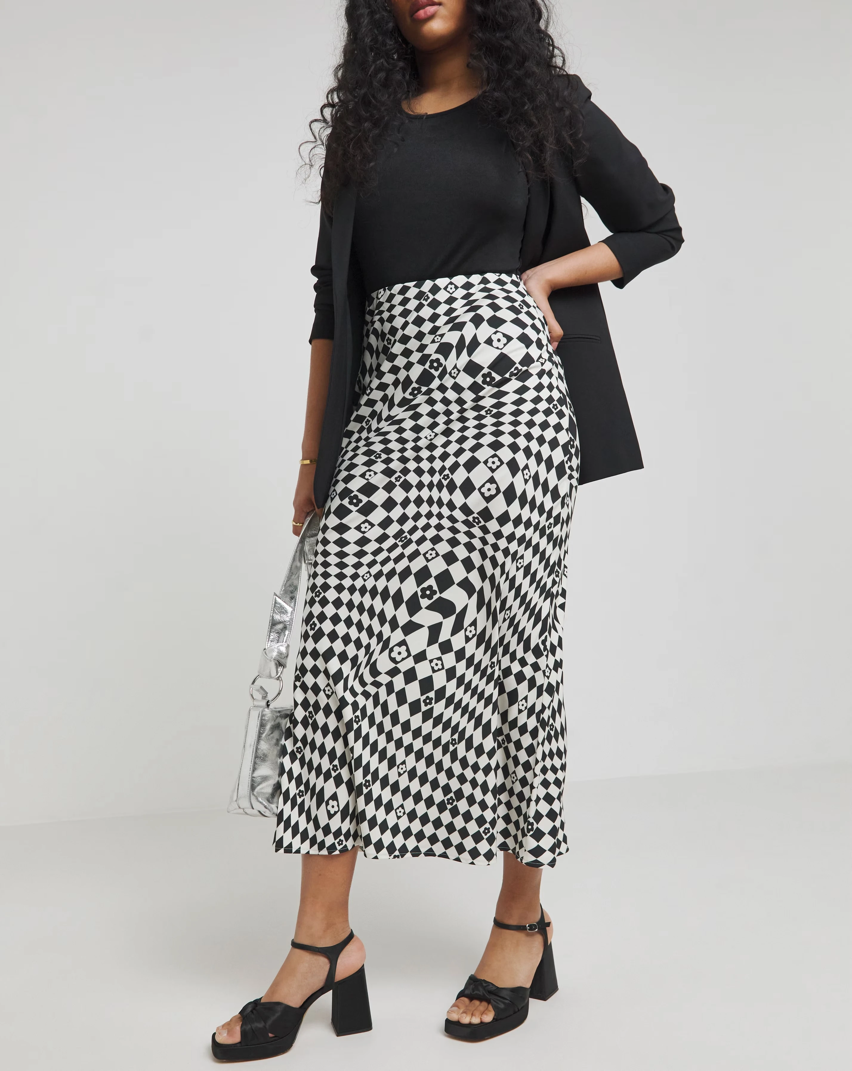 149486-twisted-wunder-black-white-flower-check-bias-slip-maxi-skirt-1.webp
