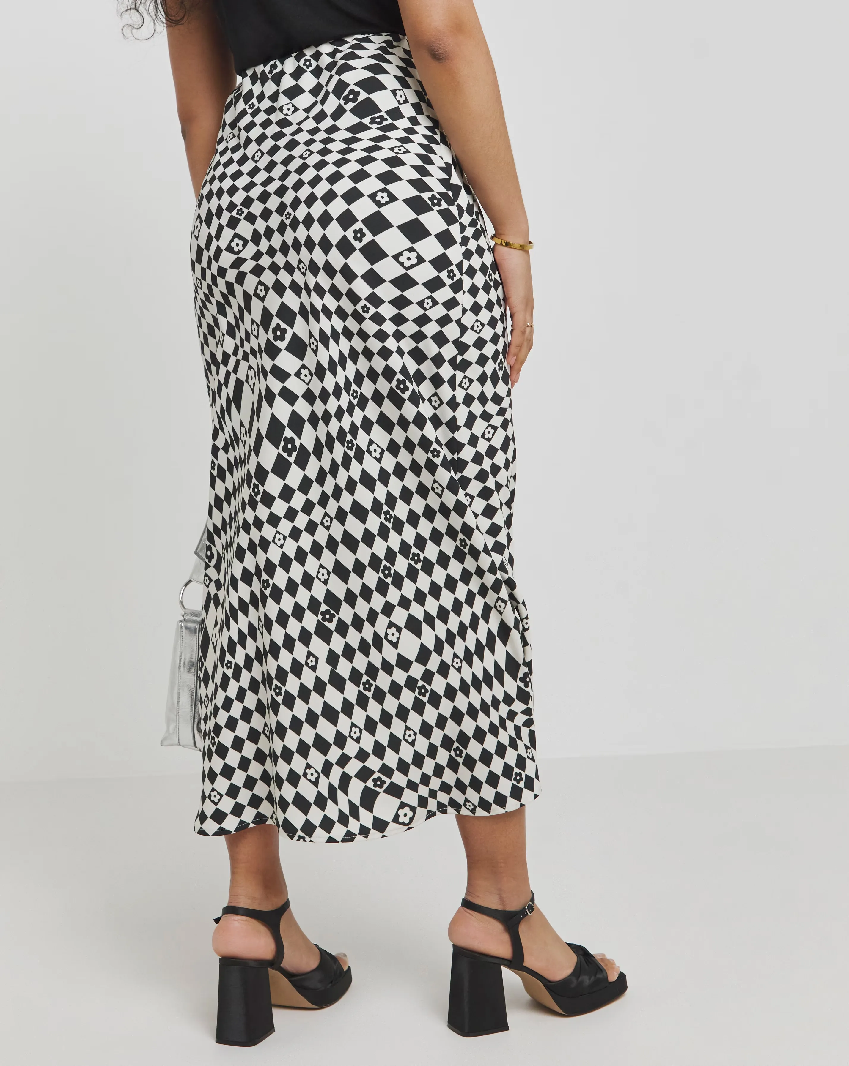 149486-twisted-wunder-black-white-flower-check-bias-slip-maxi-skirt-1.webp
