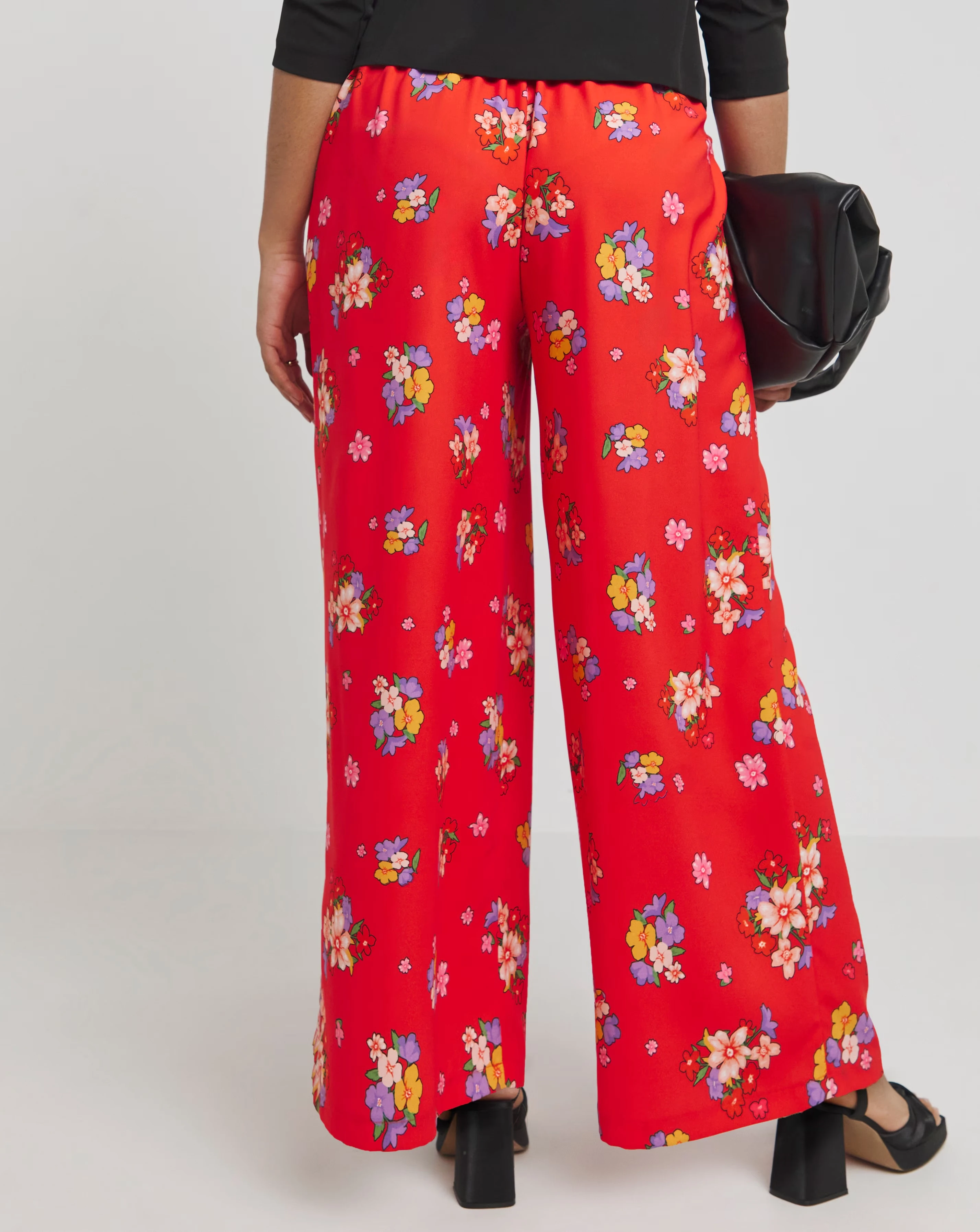 149497-twisted-wunder-red-floral-wide-pleat-pull-on-trouser-1.webp
