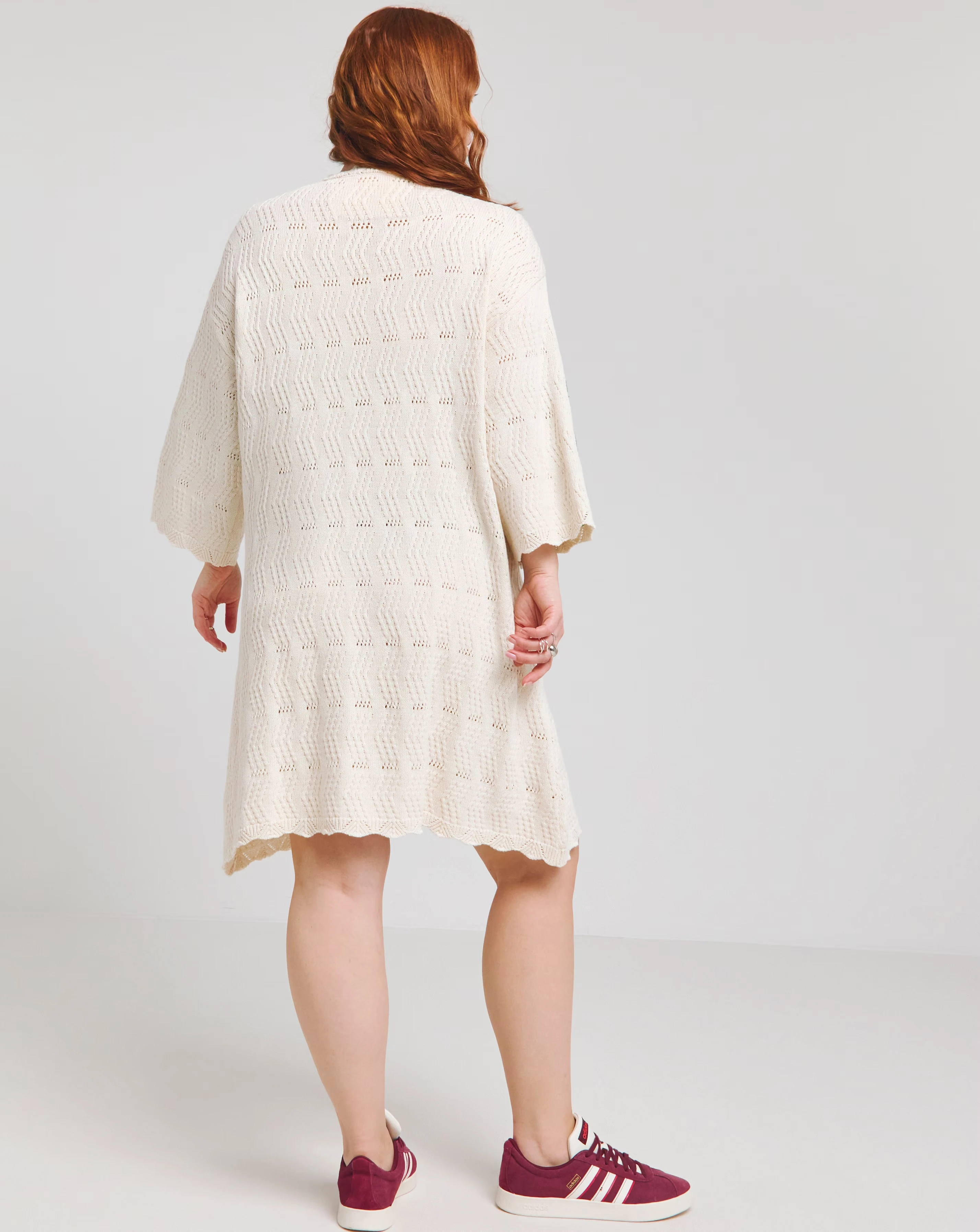 150990-native-youth-multi-stripe-short-sleeve-knitted-mini-dress-1.webp