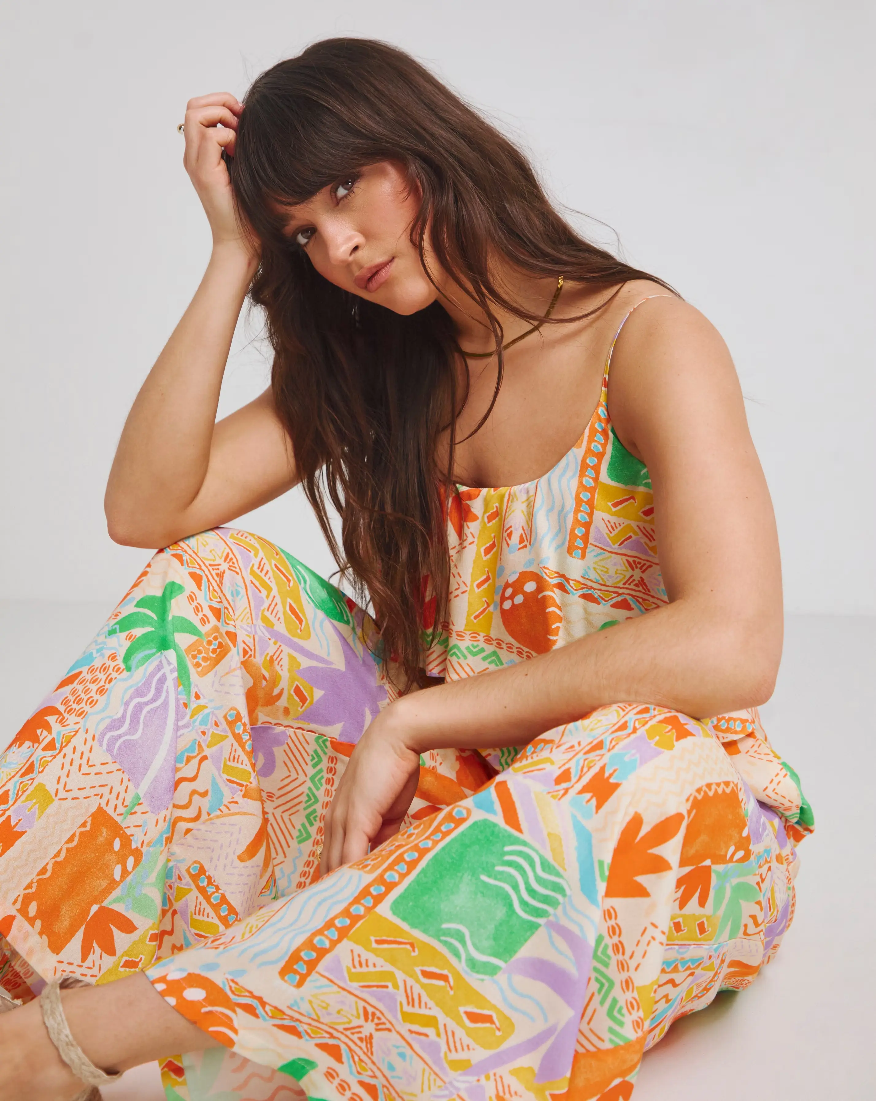 151001-native-youth-strappy-beach-palm-print-loose-fit-jumpsuit-1.webp