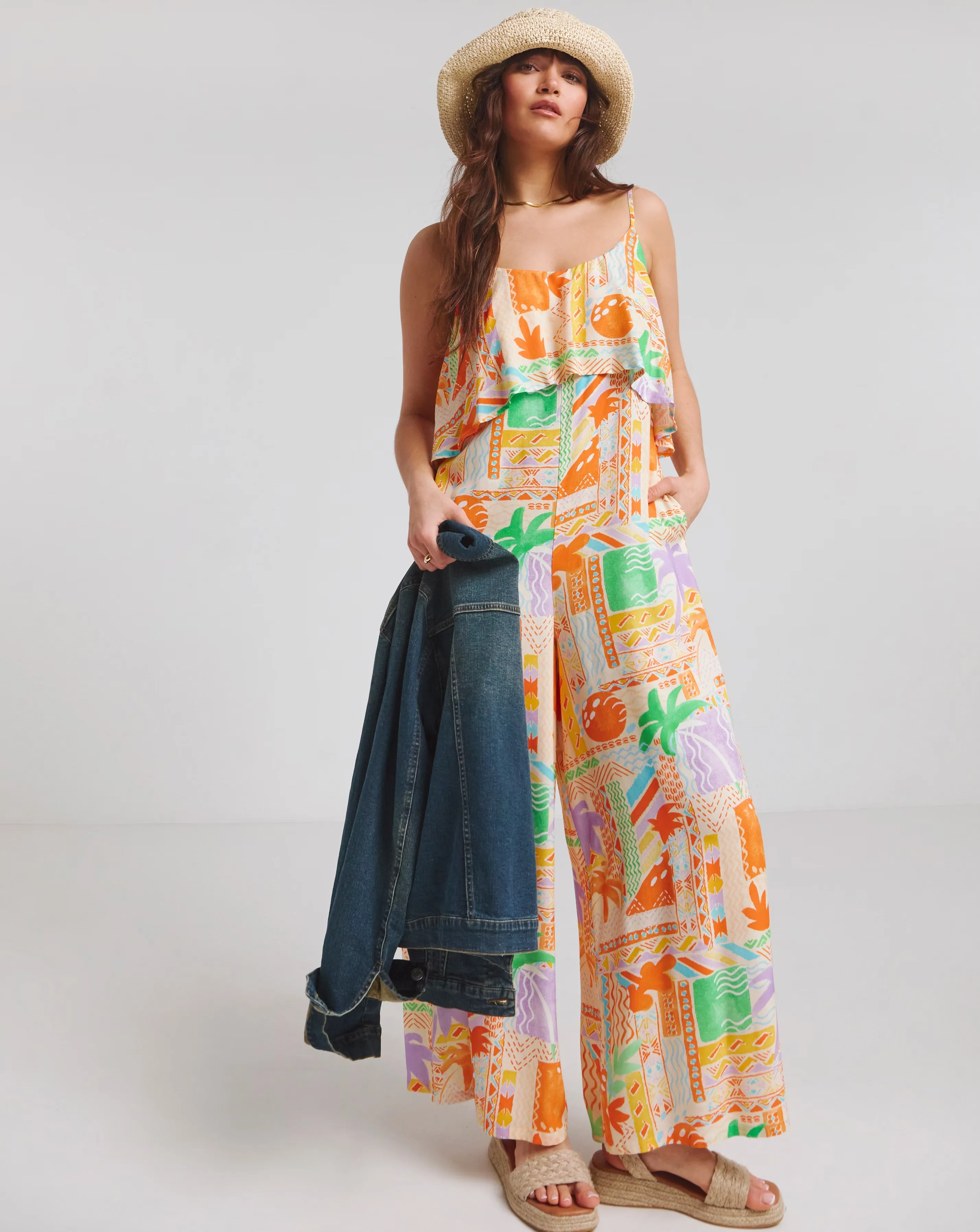 151001-native-youth-strappy-beach-palm-print-loose-fit-jumpsuit-1.webp