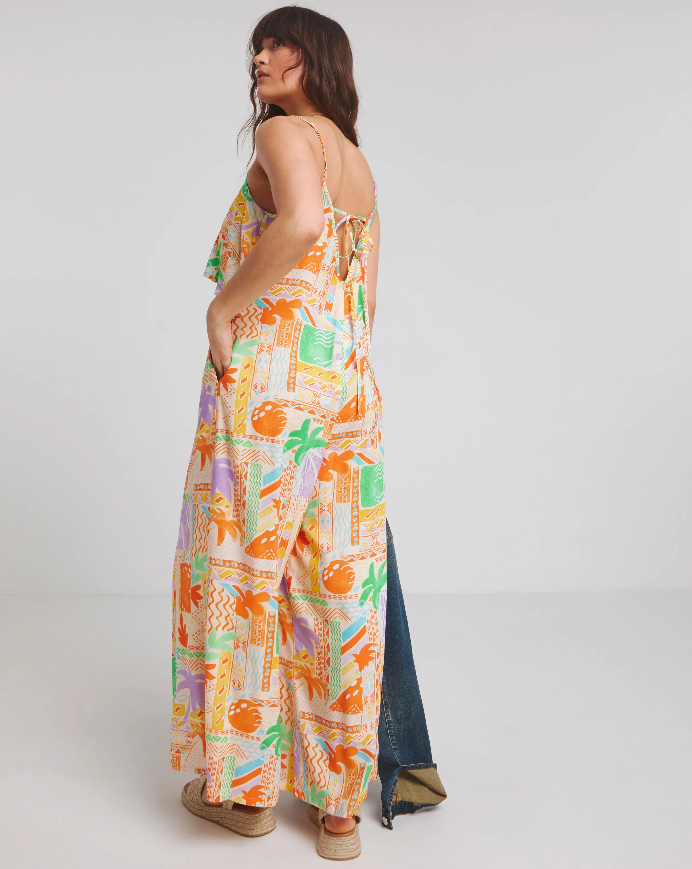 151001-native-youth-strappy-beach-palm-print-loose-fit-jumpsuit-1.webp