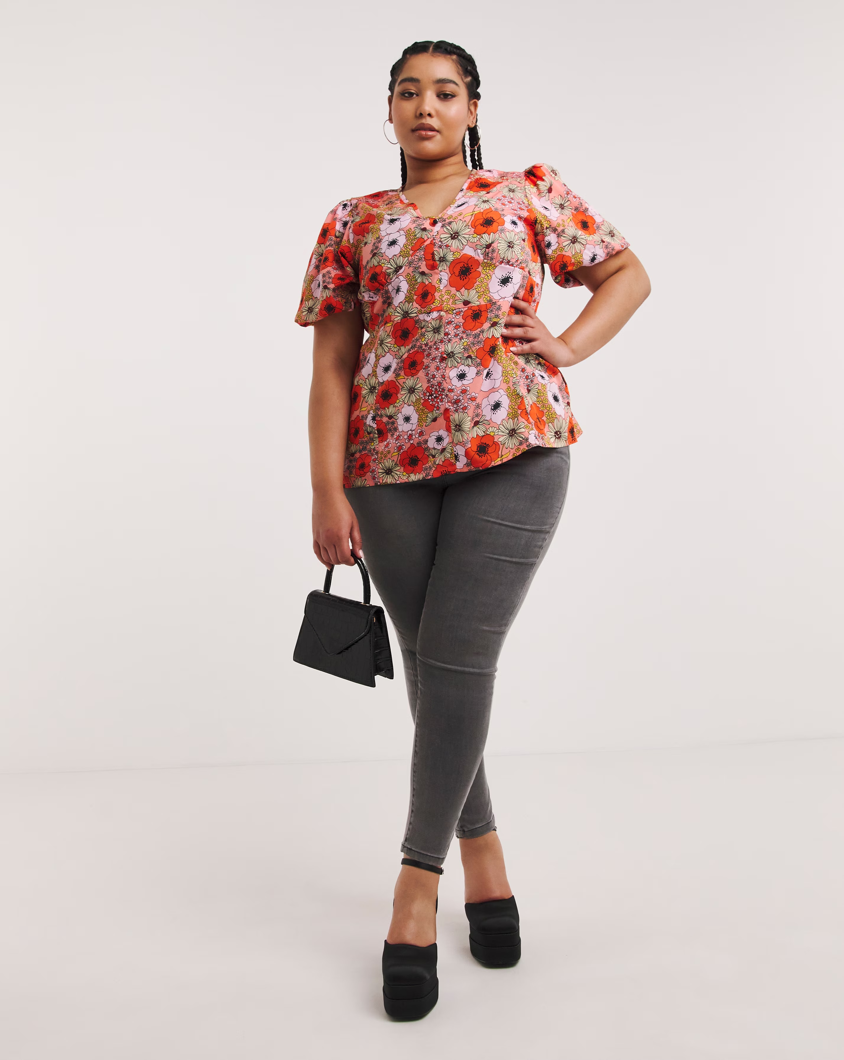 1579-floral-print-button-through-peplum-blouse-1.webp