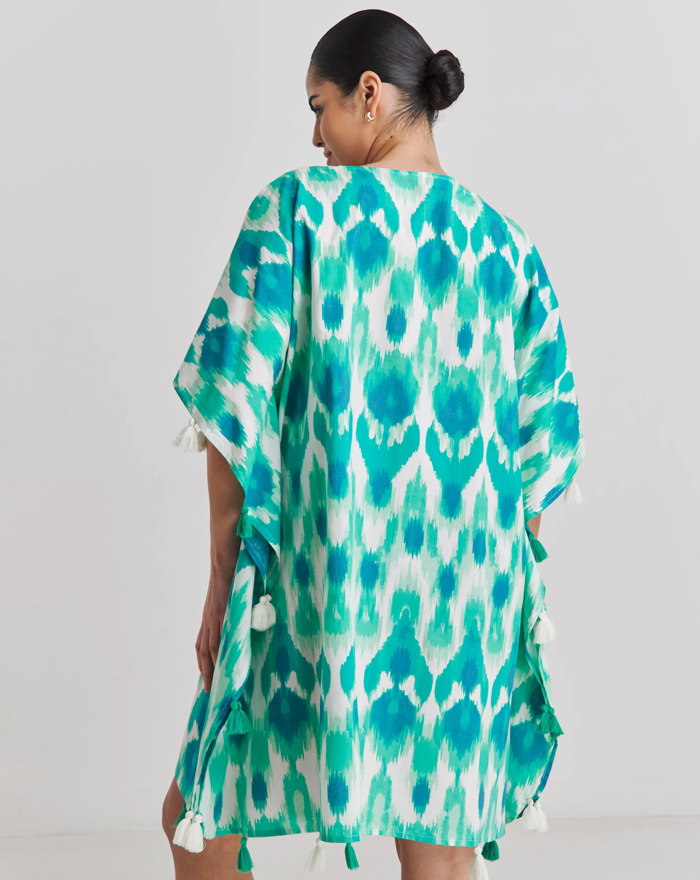 161387-magisculpt-tassel-trim-beach-kaftan-1.webp