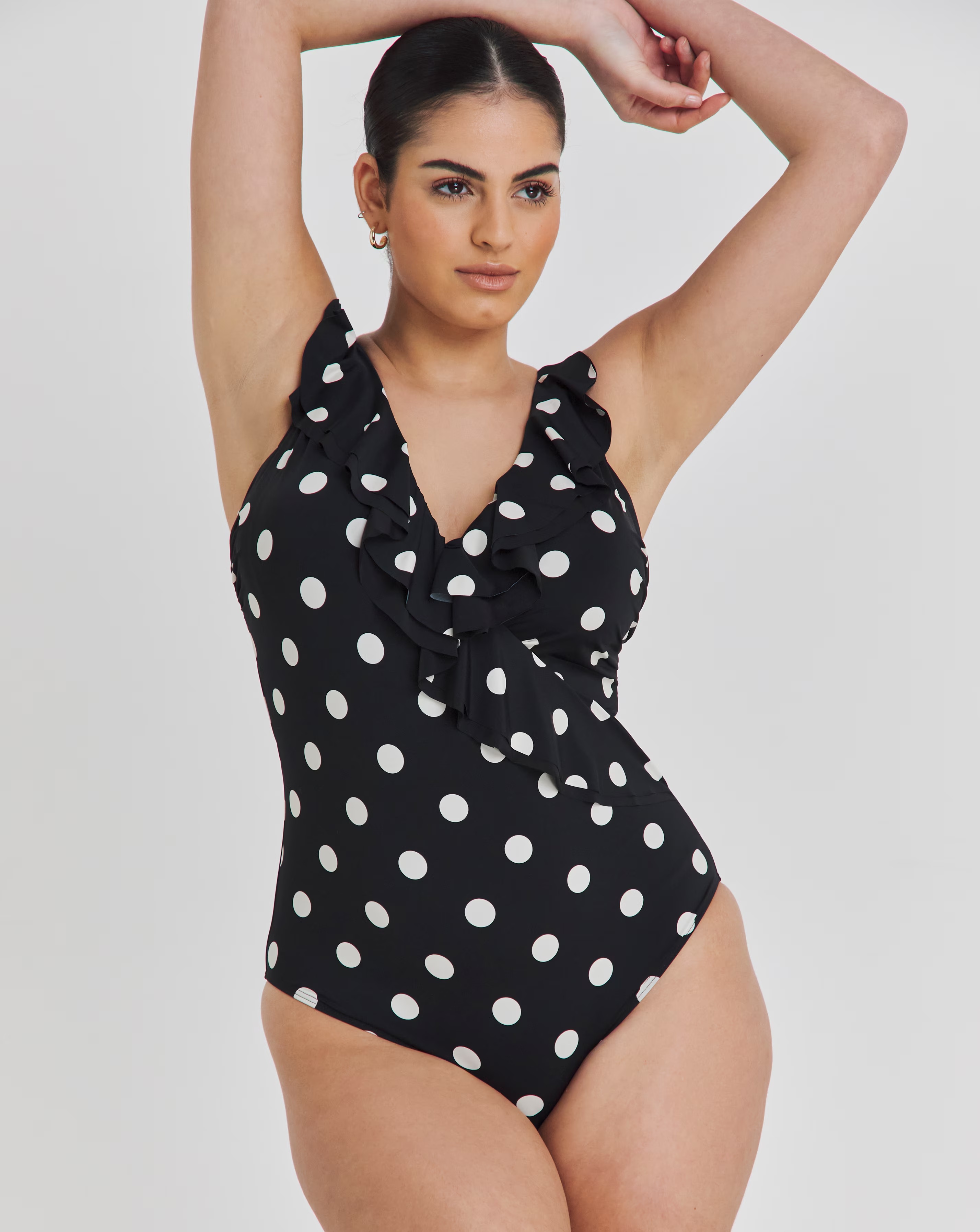 163478-magisculpt-firm-control-ruffle-swimsuit-1.webp
