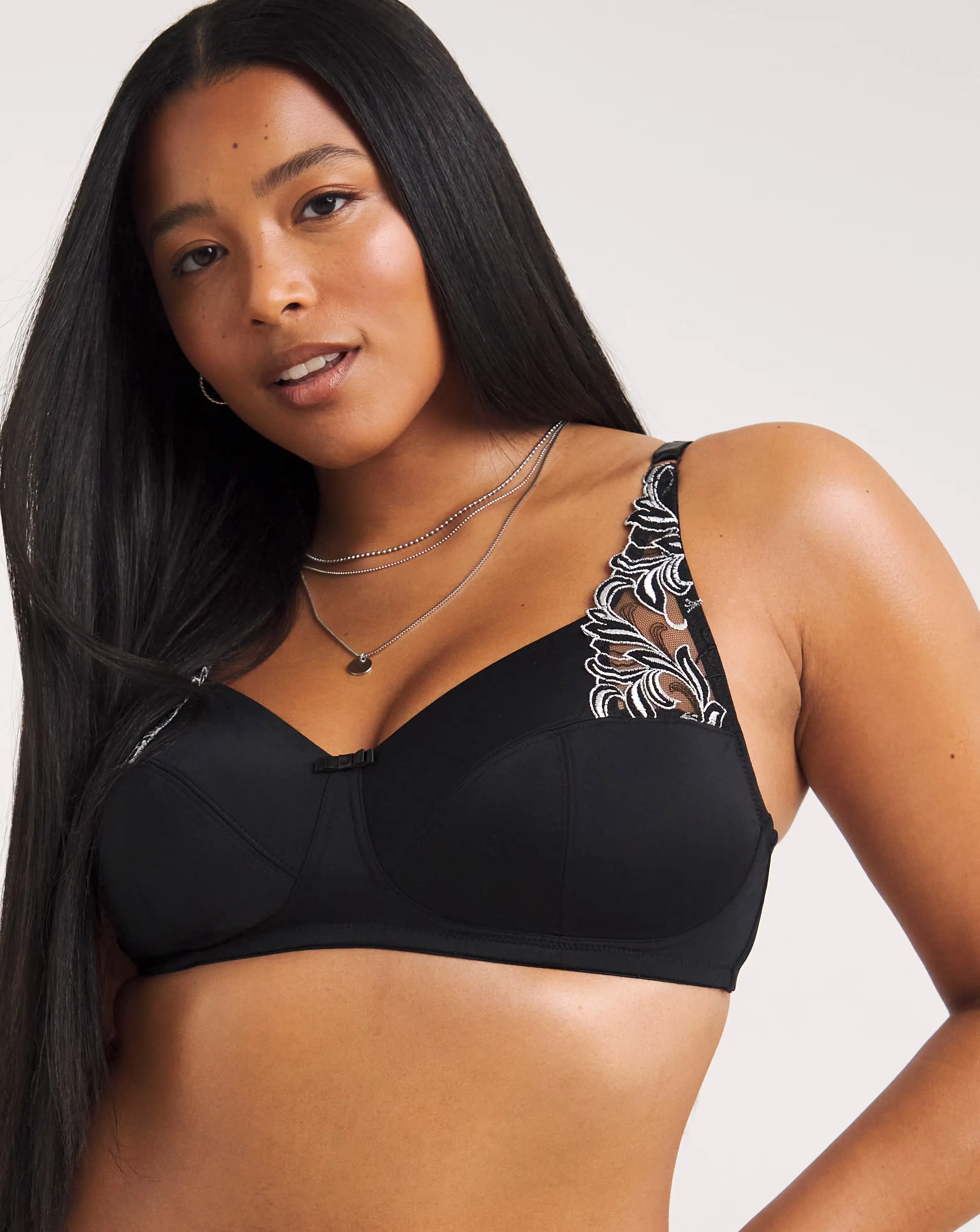 169232-pretty-secrets-2-pack-flora-embroidered-full-cup-non-wired-black-white-bras-1.webp