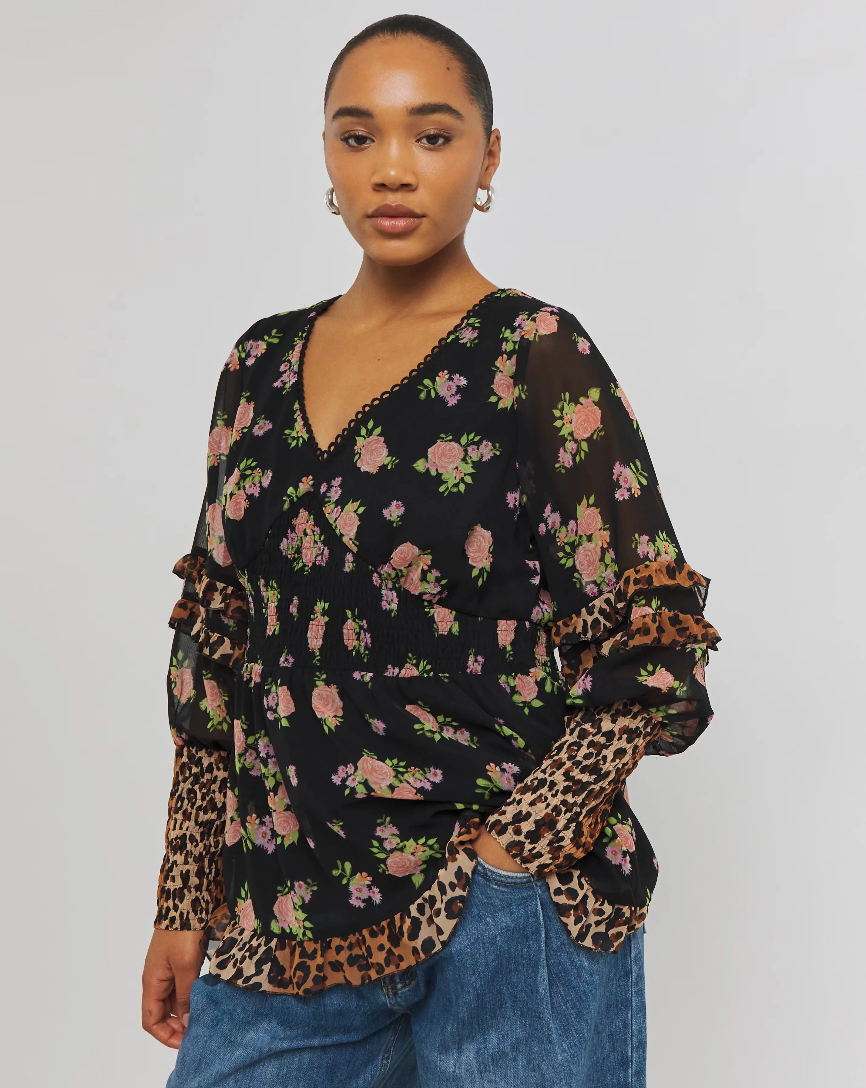 Mixed Print Shirred Long Sleeve V-Neck Peplum Blouse 1 1695-mixed-print-shirred-long-sleeve-v-neck-peplum-blouse-1.webp