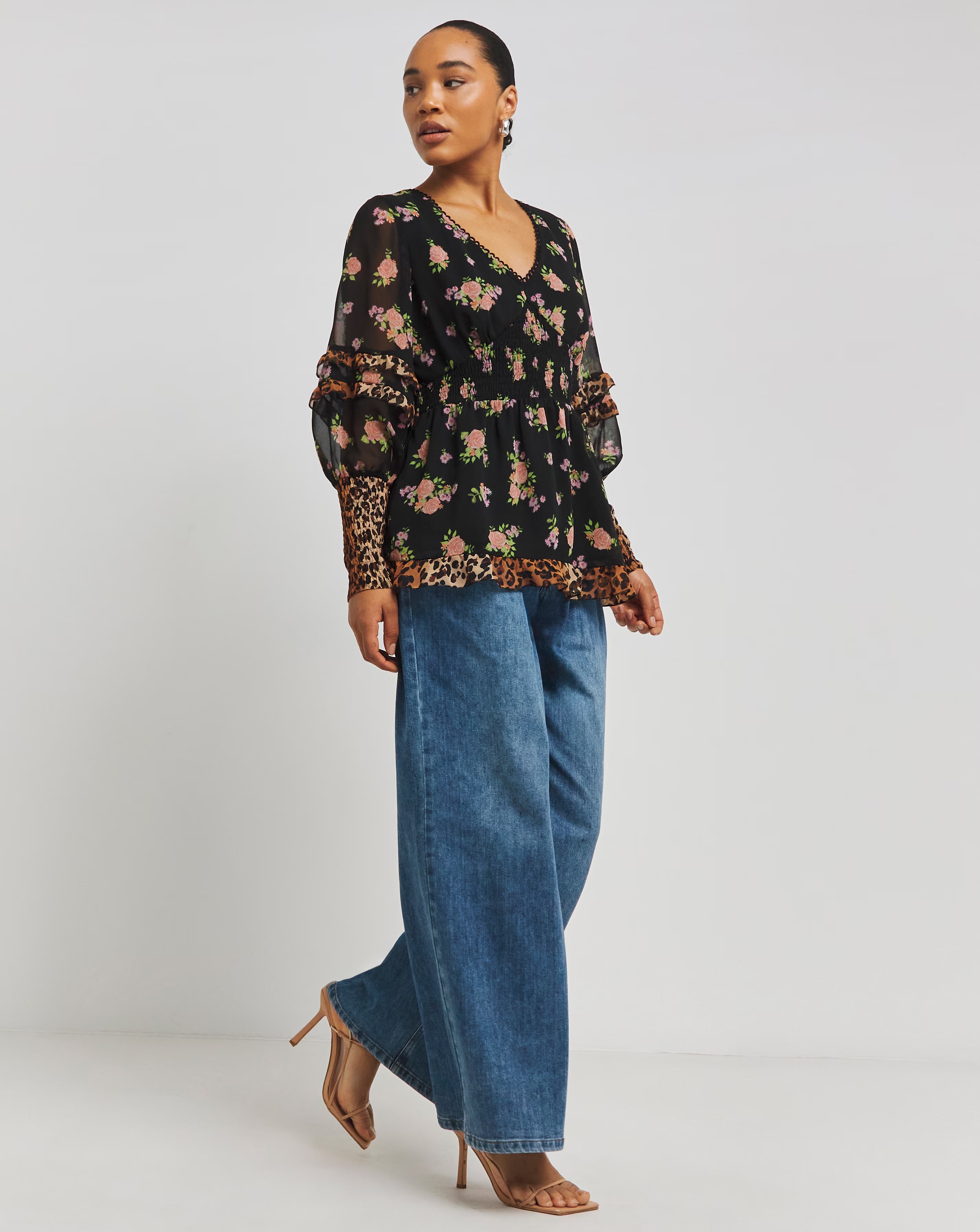 1695-mixed-print-shirred-long-sleeve-v-neck-peplum-blouse-1.webp