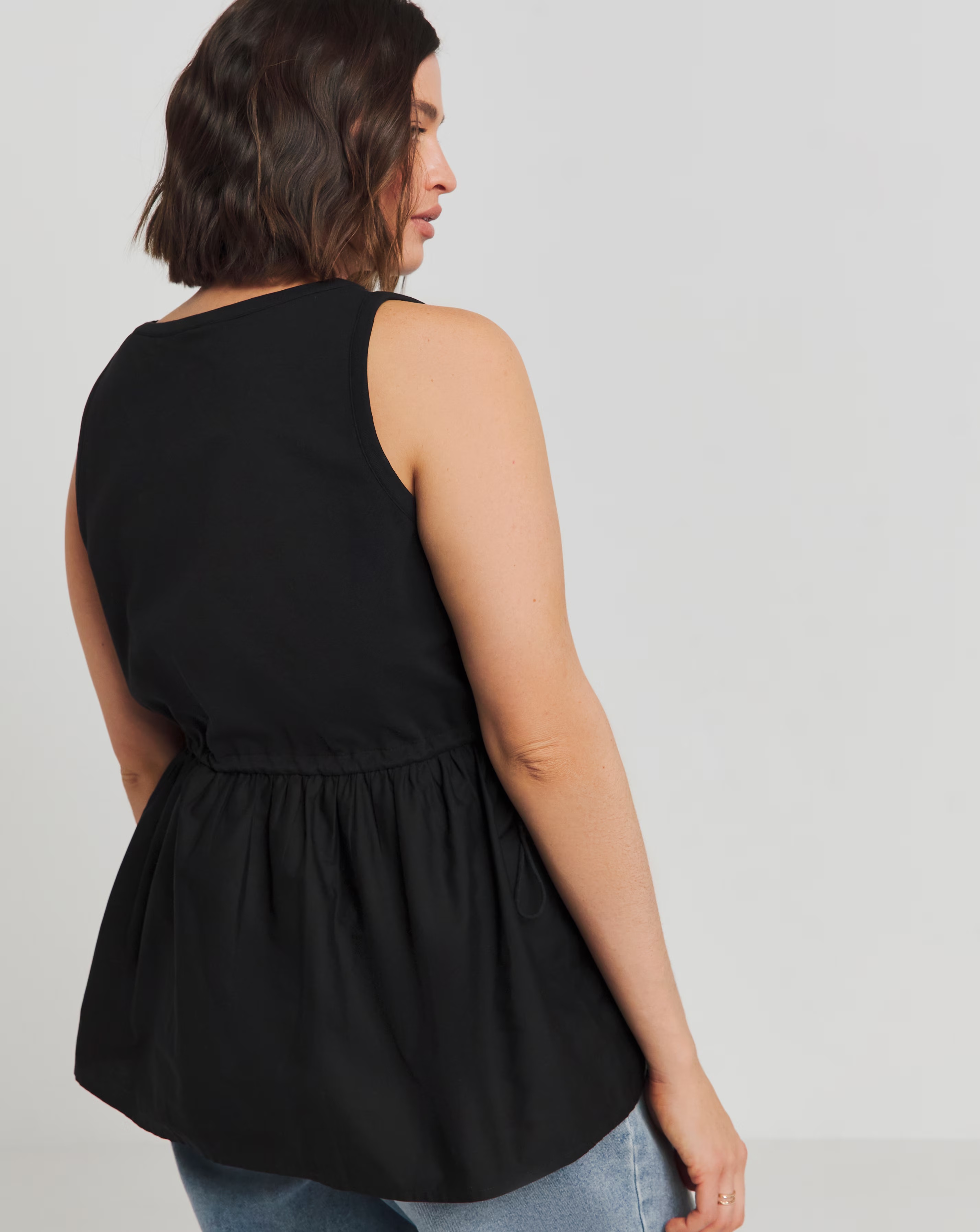 169916-black-sleeveless-poplin-jersey-mix-tank-top-1.webp