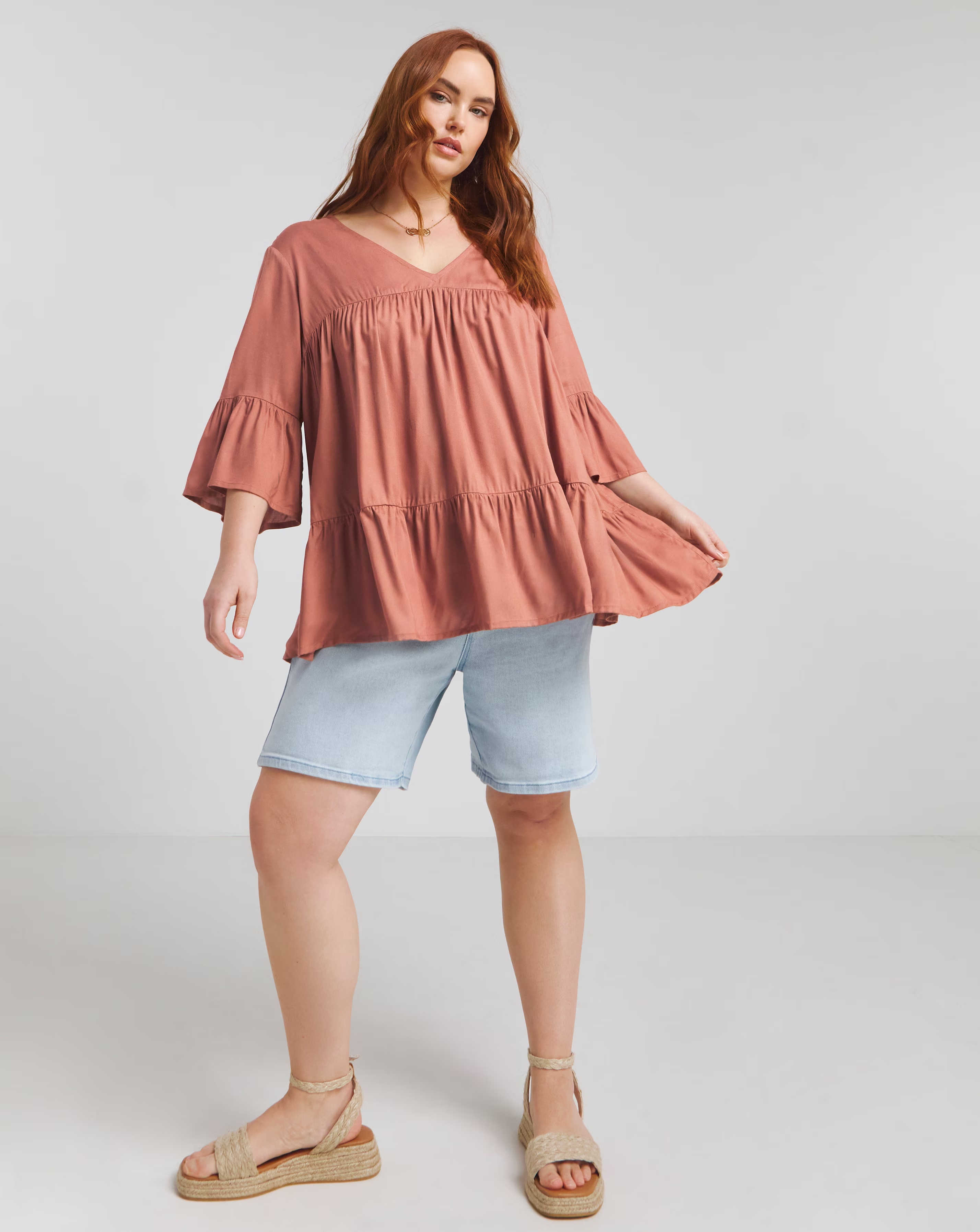 170098-terracotta-viscose-v-neck-tiered-smock-blouse-1.webp