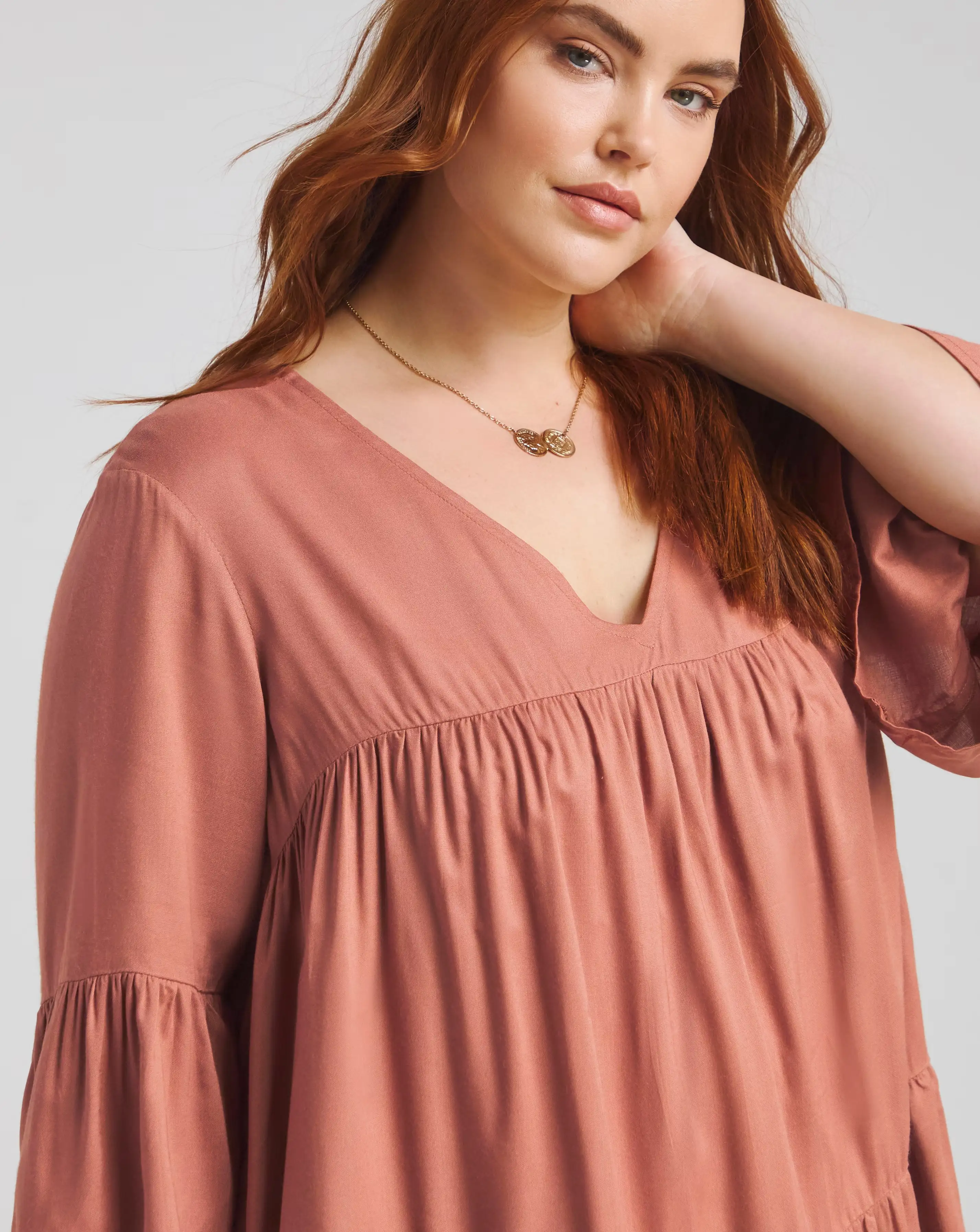 170098-terracotta-viscose-v-neck-tiered-smock-blouse-1.webp