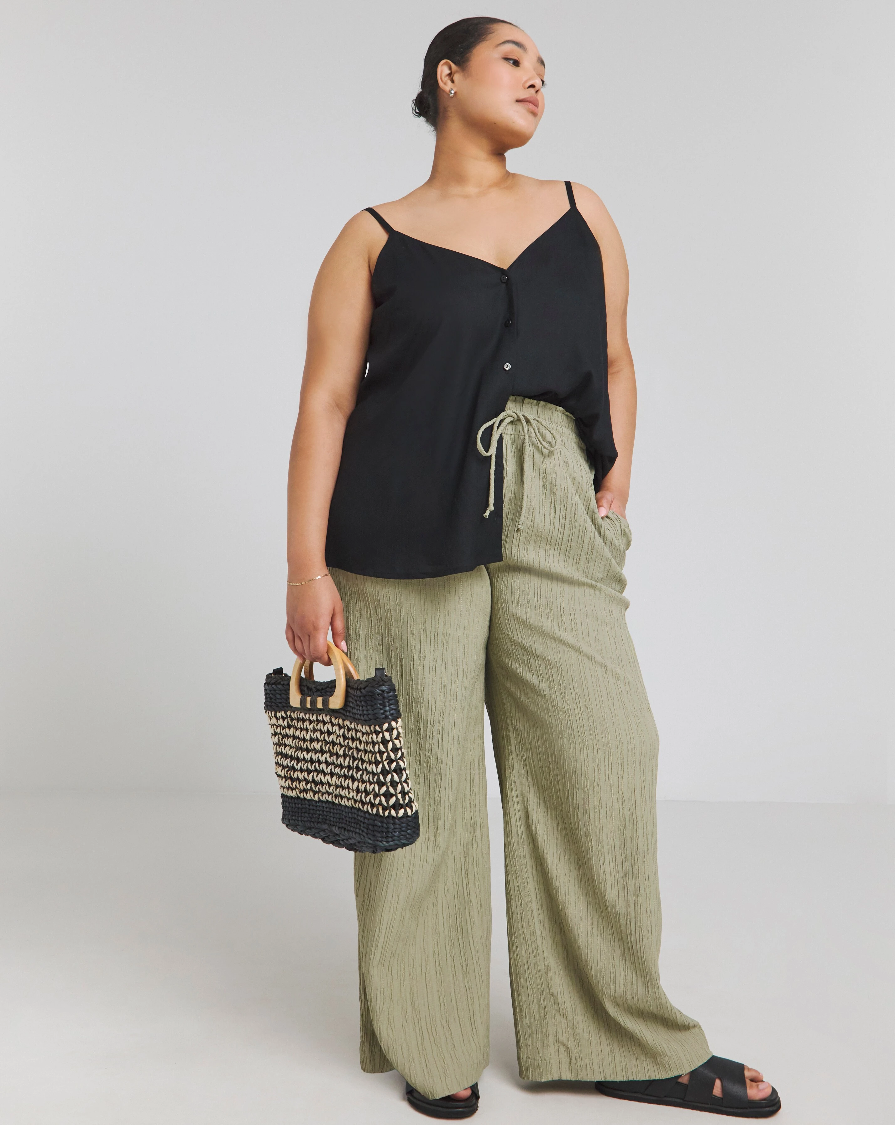 Black Button Through Sleeveless Viscose Cami 1 170514-black-button-through-sleeveless-viscose-cami-1.webp