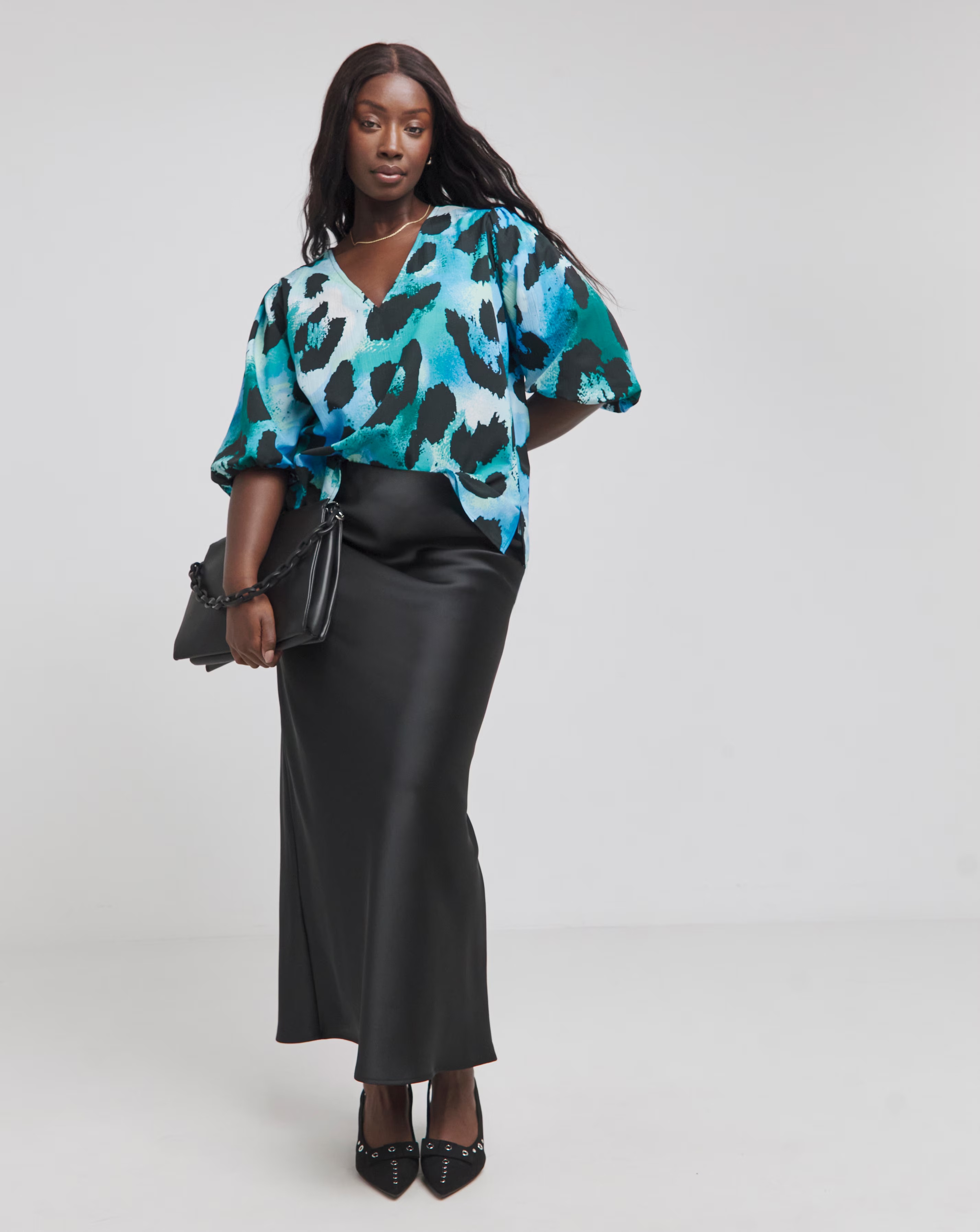 170670-blue-animal-v-neck-puff-sleeve-blouse-1.webp