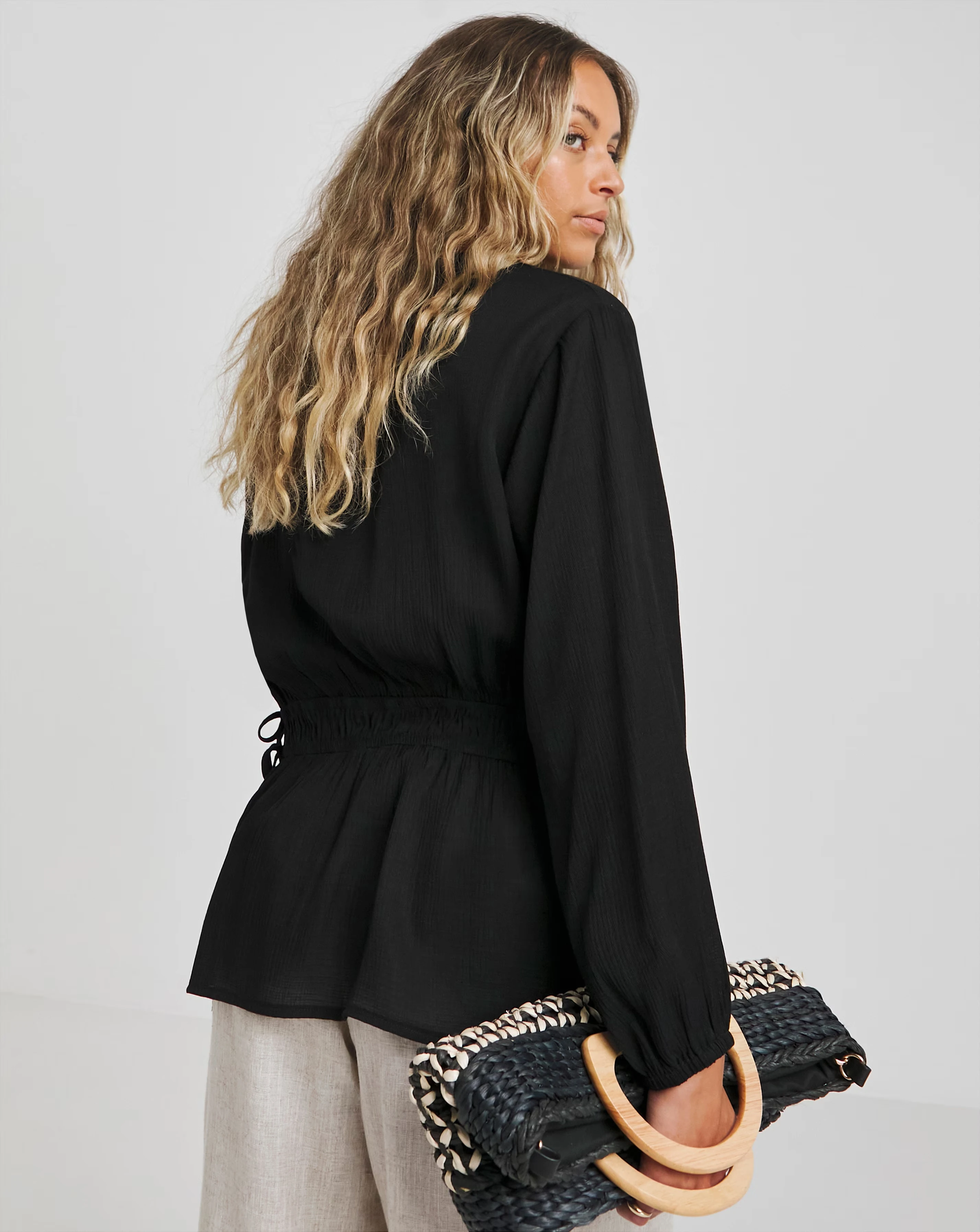 170813-simply-be-black-plunge-elasticated-waist-long-sleeve-blouse-1.webp