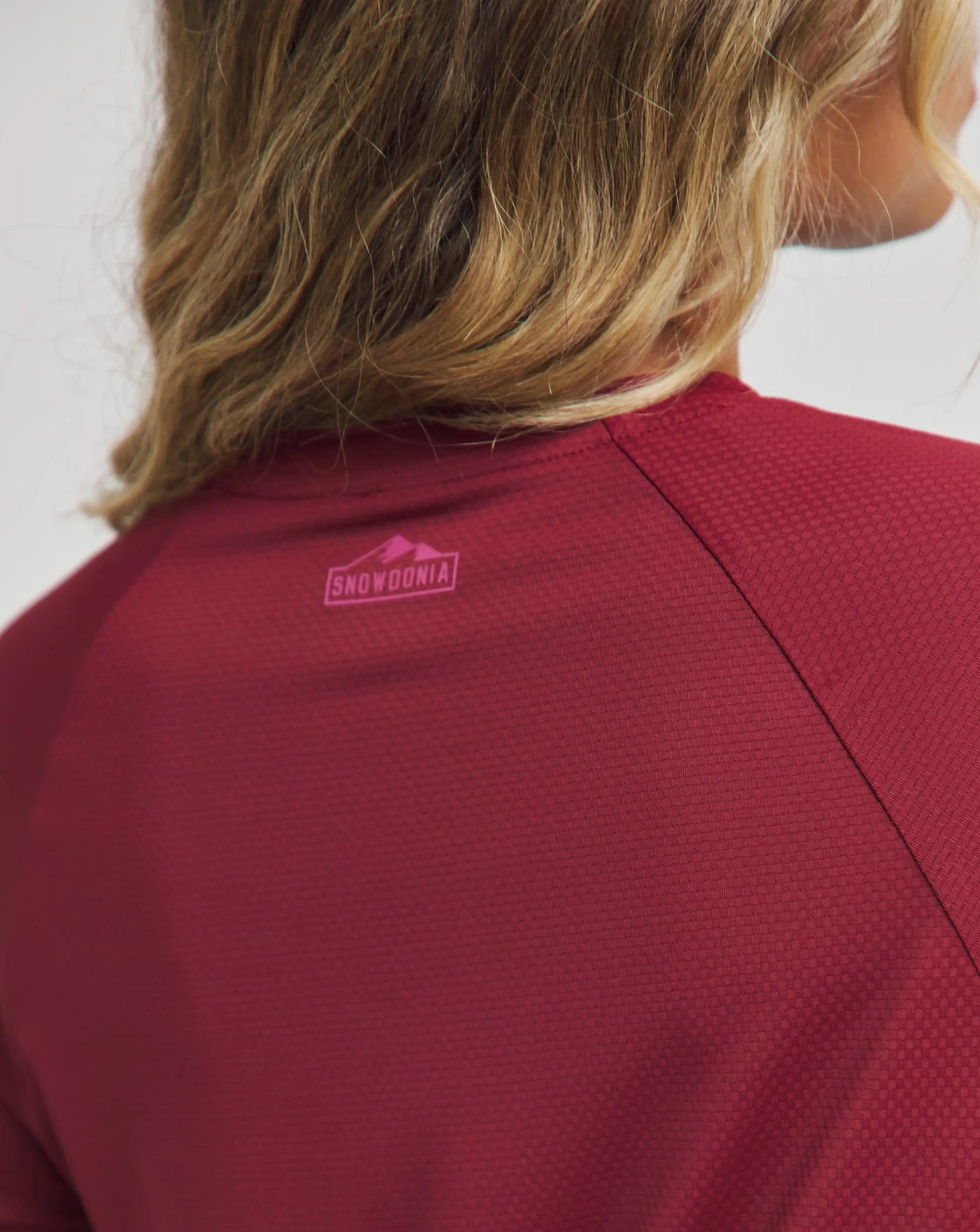 172109-snowdonia-pink-spf-50-base-layer-top-1.webp