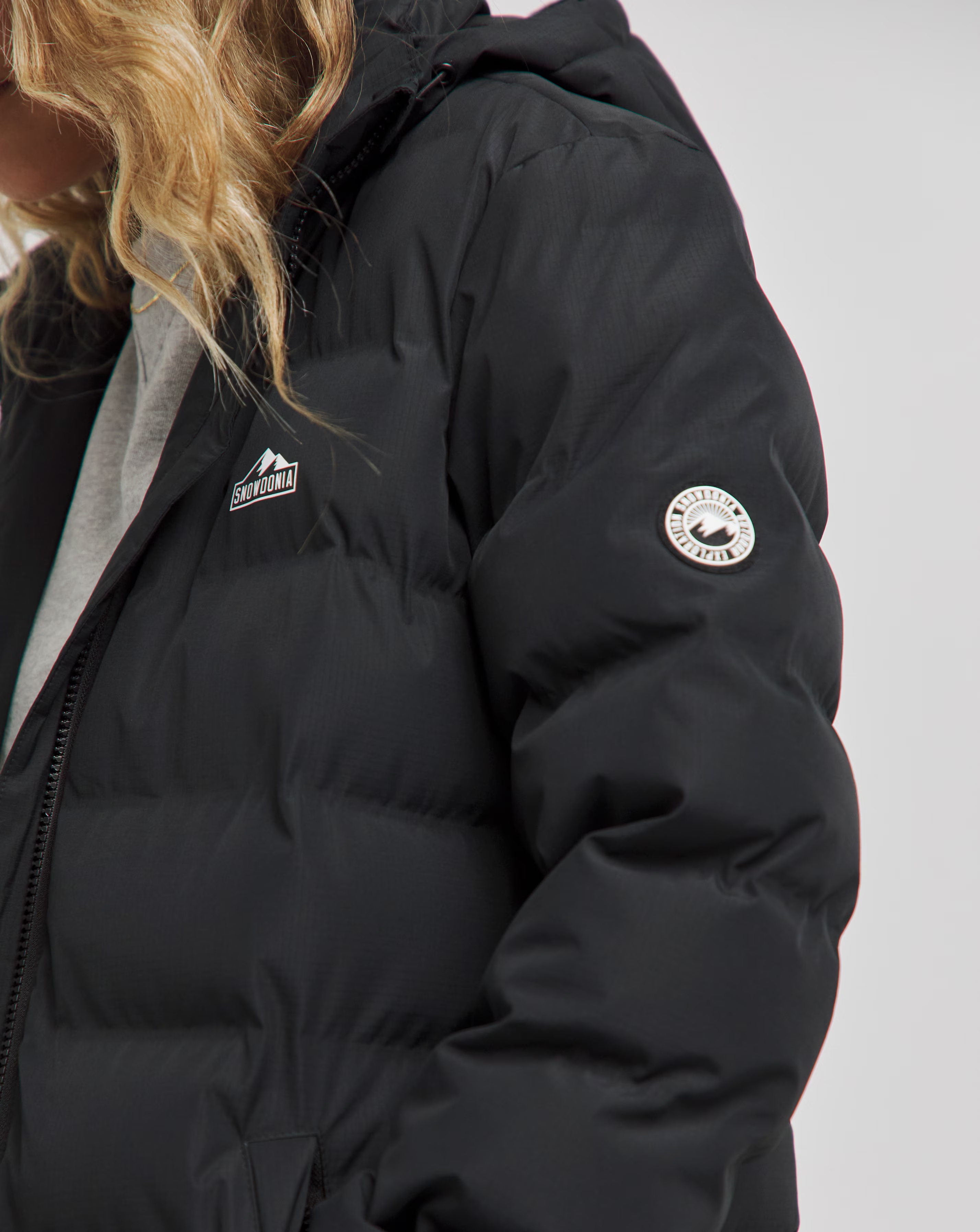 172213-snowdonia-black-showerproof-long-padded-jacket-1.jpg