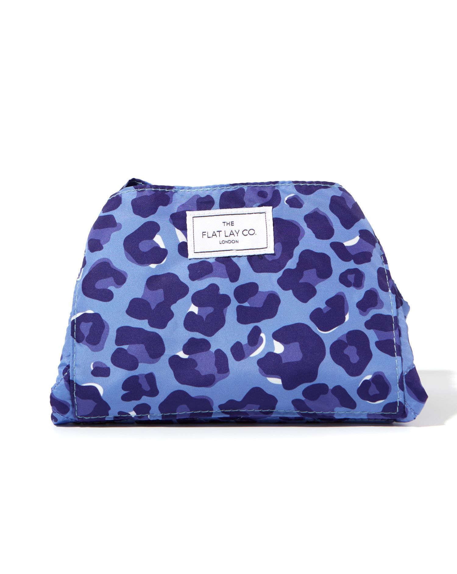 175715-the-flat-lay-co-drawstring-makeup-bag-in-blue-leopard-1.jpg