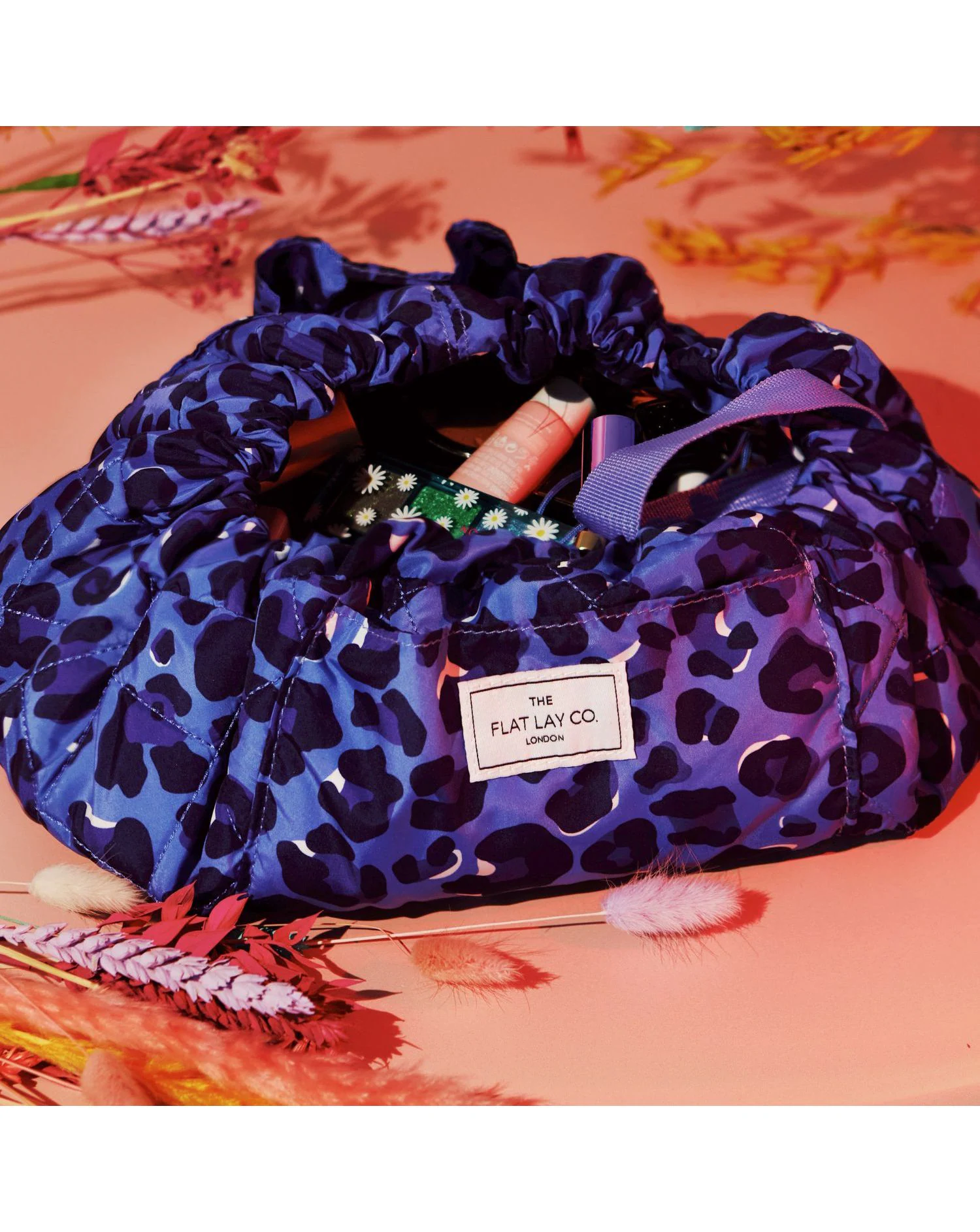 175715-the-flat-lay-co-drawstring-makeup-bag-in-blue-leopard-1.jpg