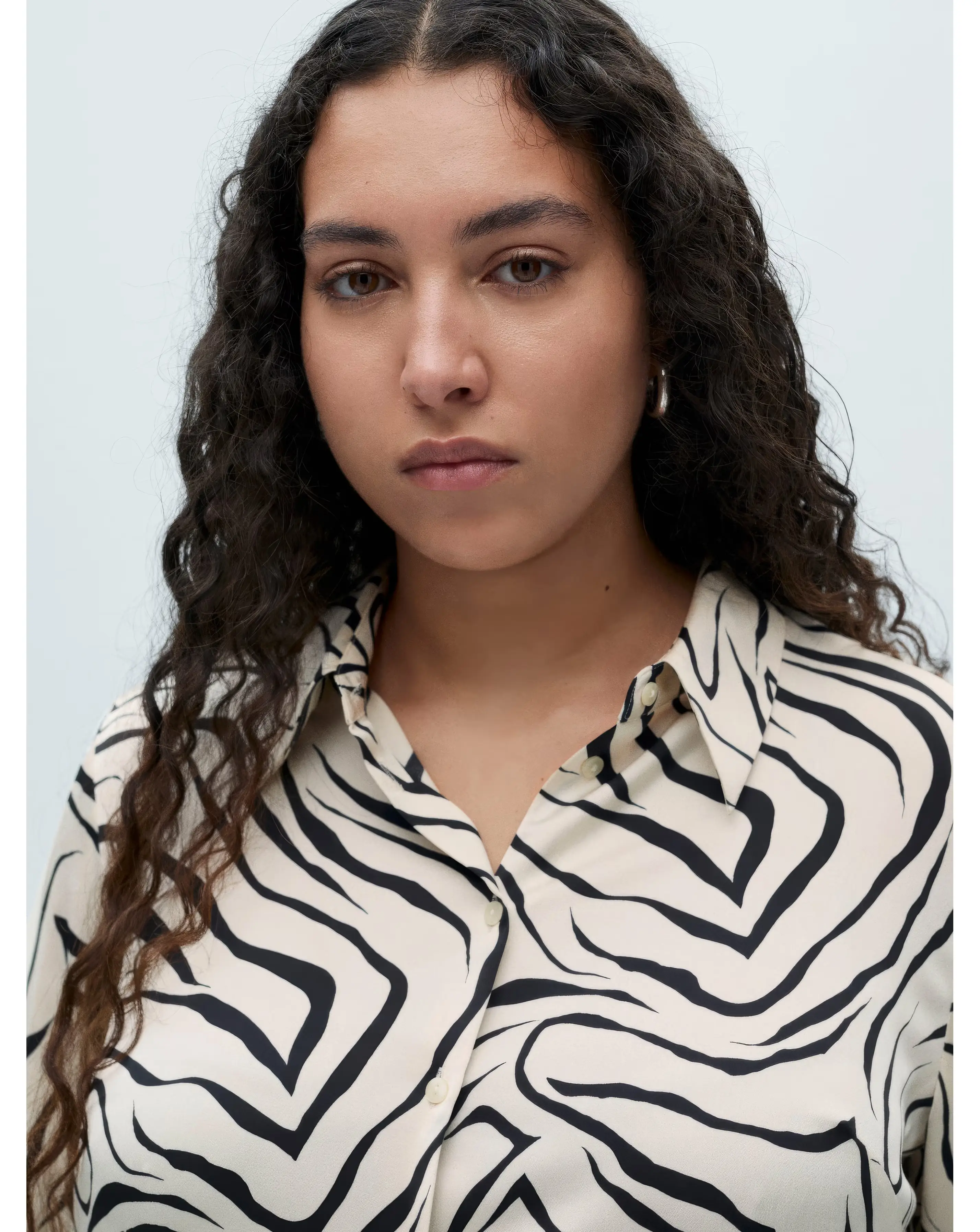 177573-mango-ideale-zebra-print-shirt-1.webp