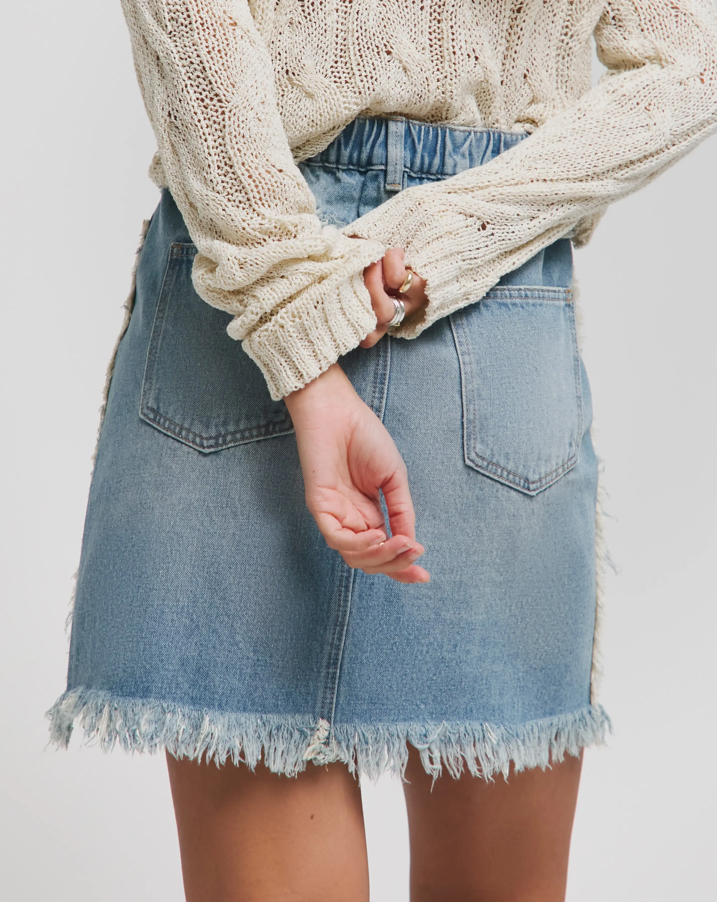 180640-simply-be-light-wash-frayed-hem-denim-mini-skirt-1.webp