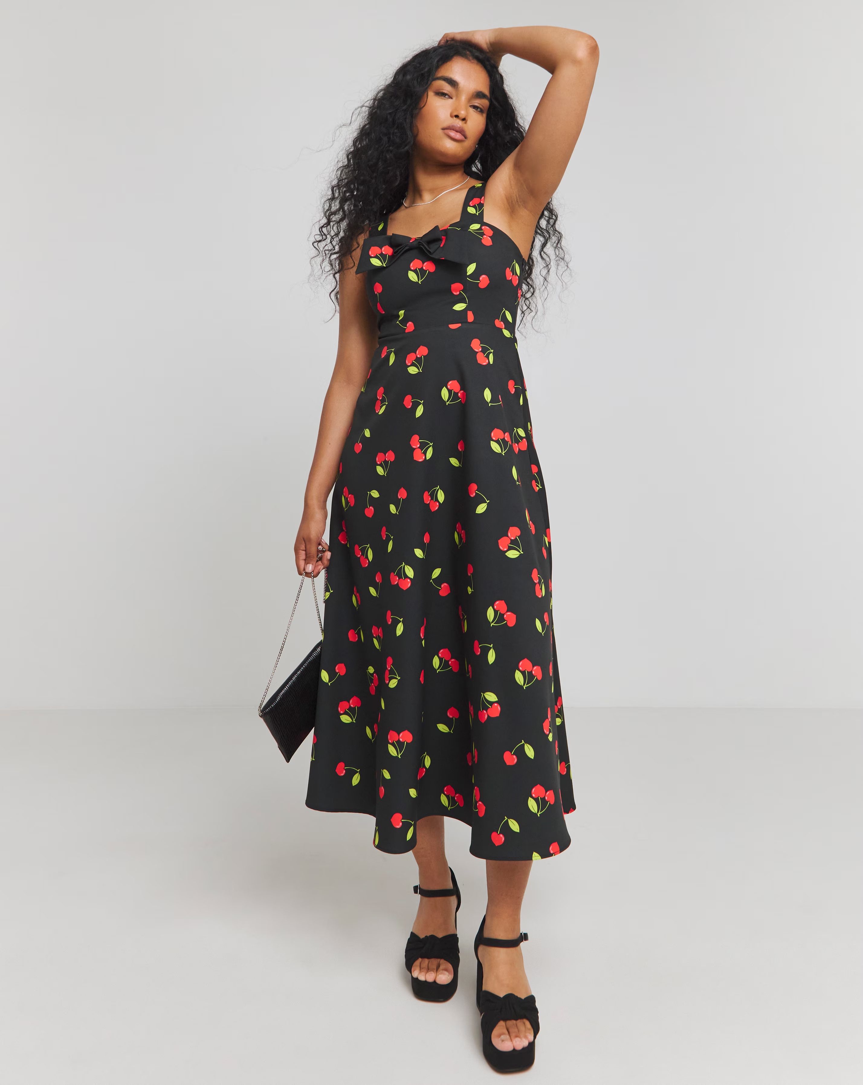 23401-twisted-wunder-pamela-cherry-50-x27-s-bow-detail-swing-midaxi-dress-1.webp