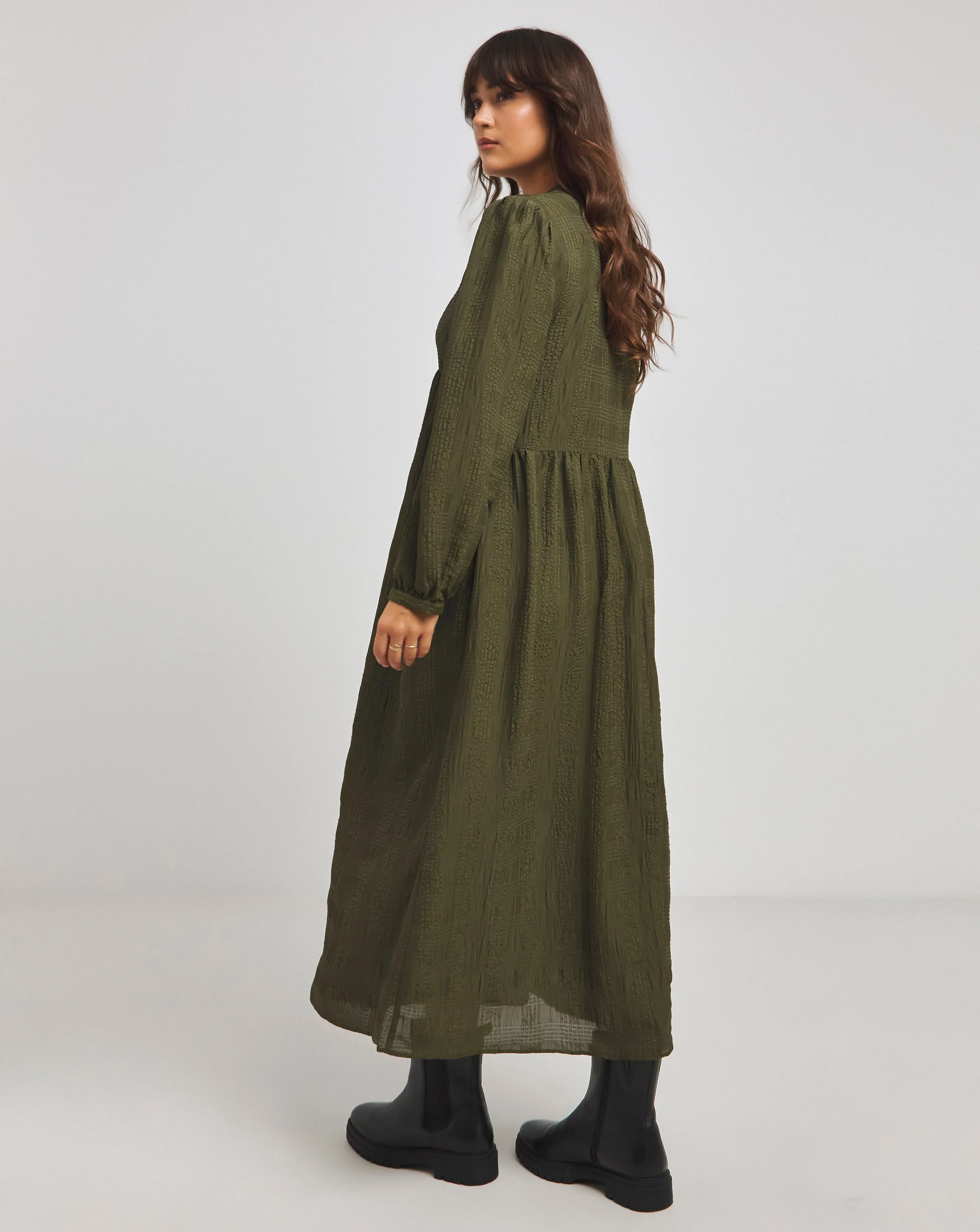 24048-native-youth-tonal-stripe-smock-maxi-dress-with-oversized-pockets-1.webp