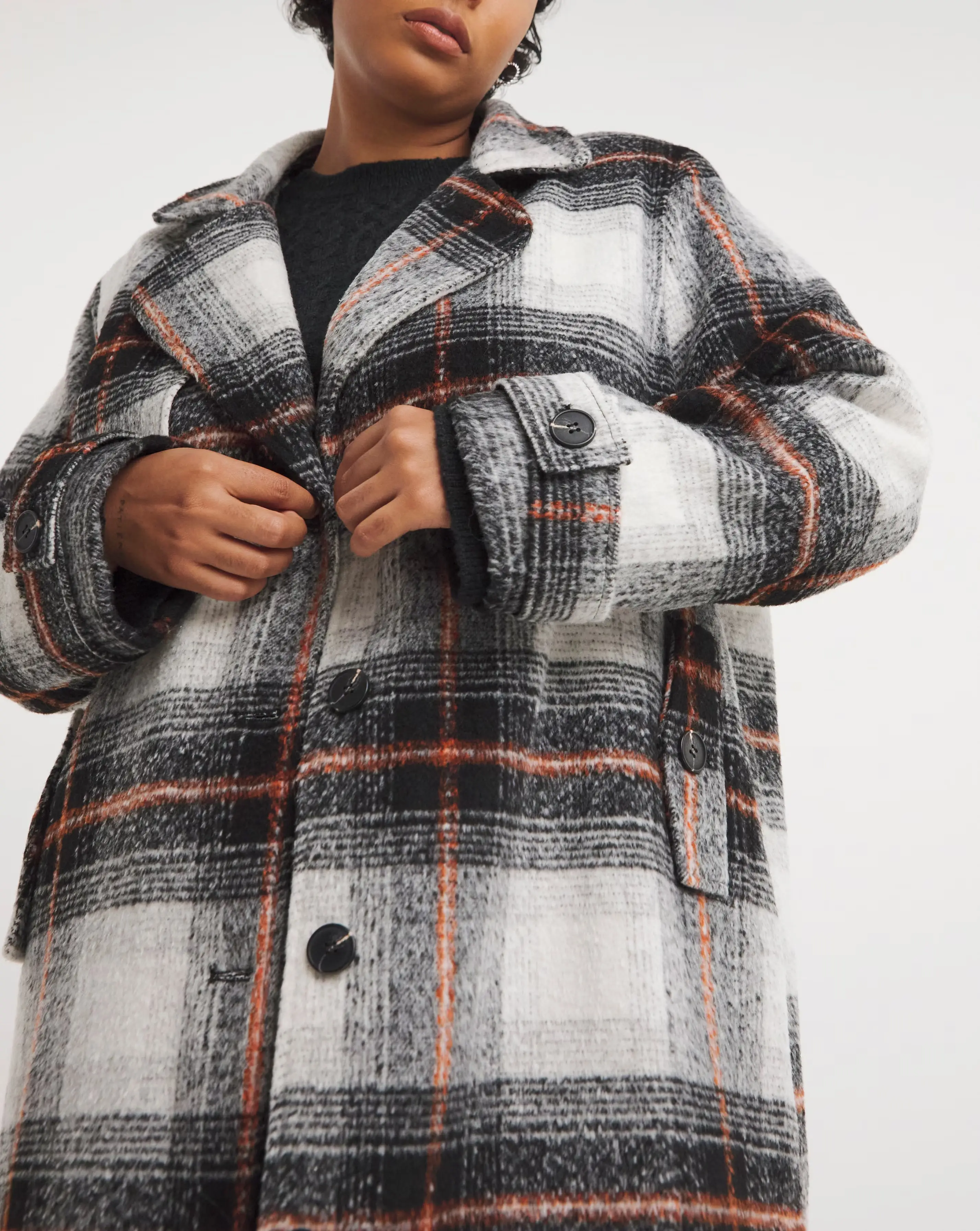 26836-native-youth-longline-check-coat-with-storm-flap-1.jpg