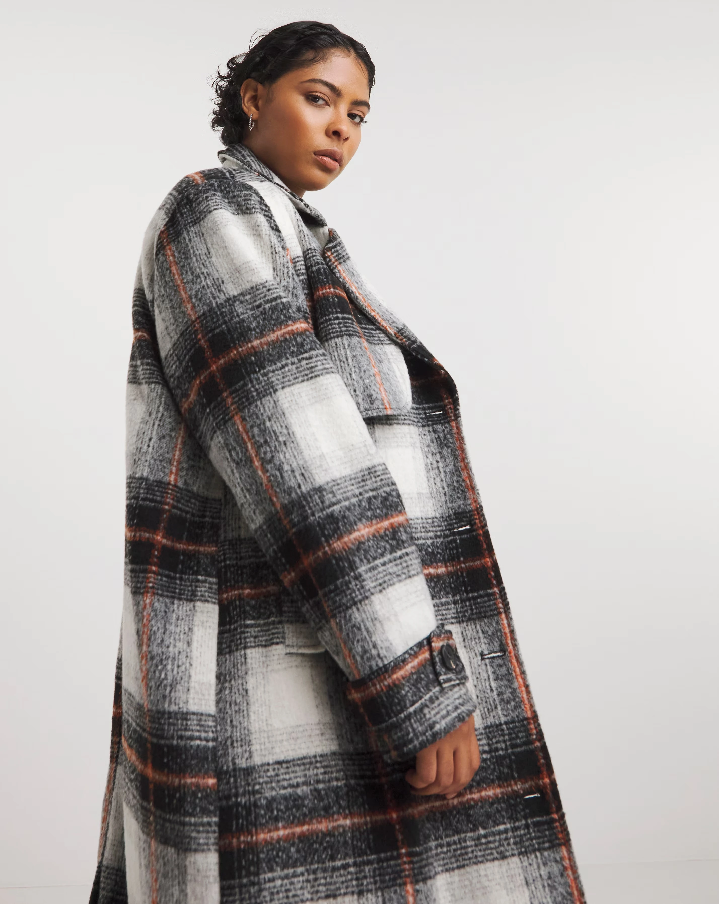 26836-native-youth-longline-check-coat-with-storm-flap-1.jpg
