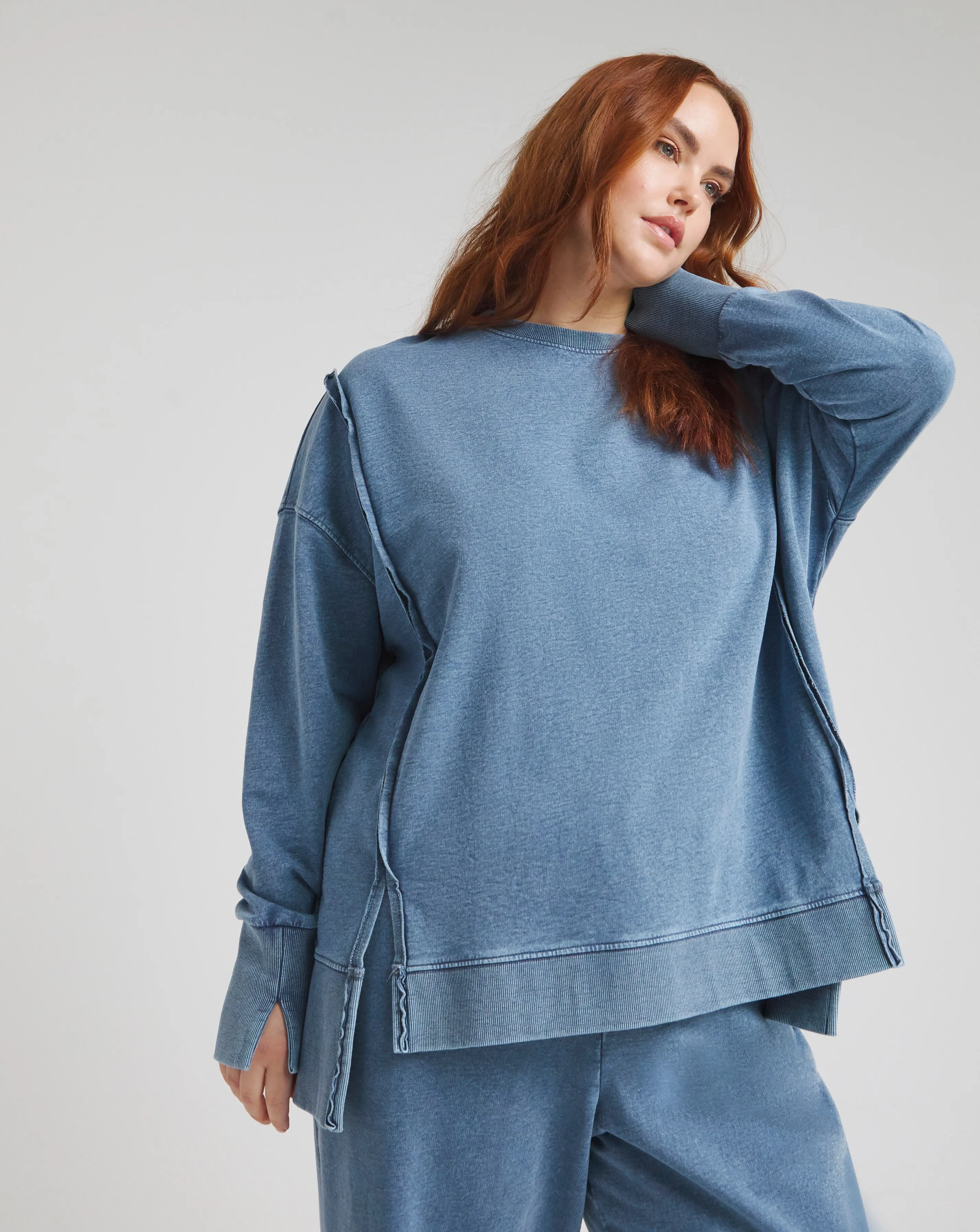 Blue Acid Wash Exposed Seam Dip Back Sweatshirt