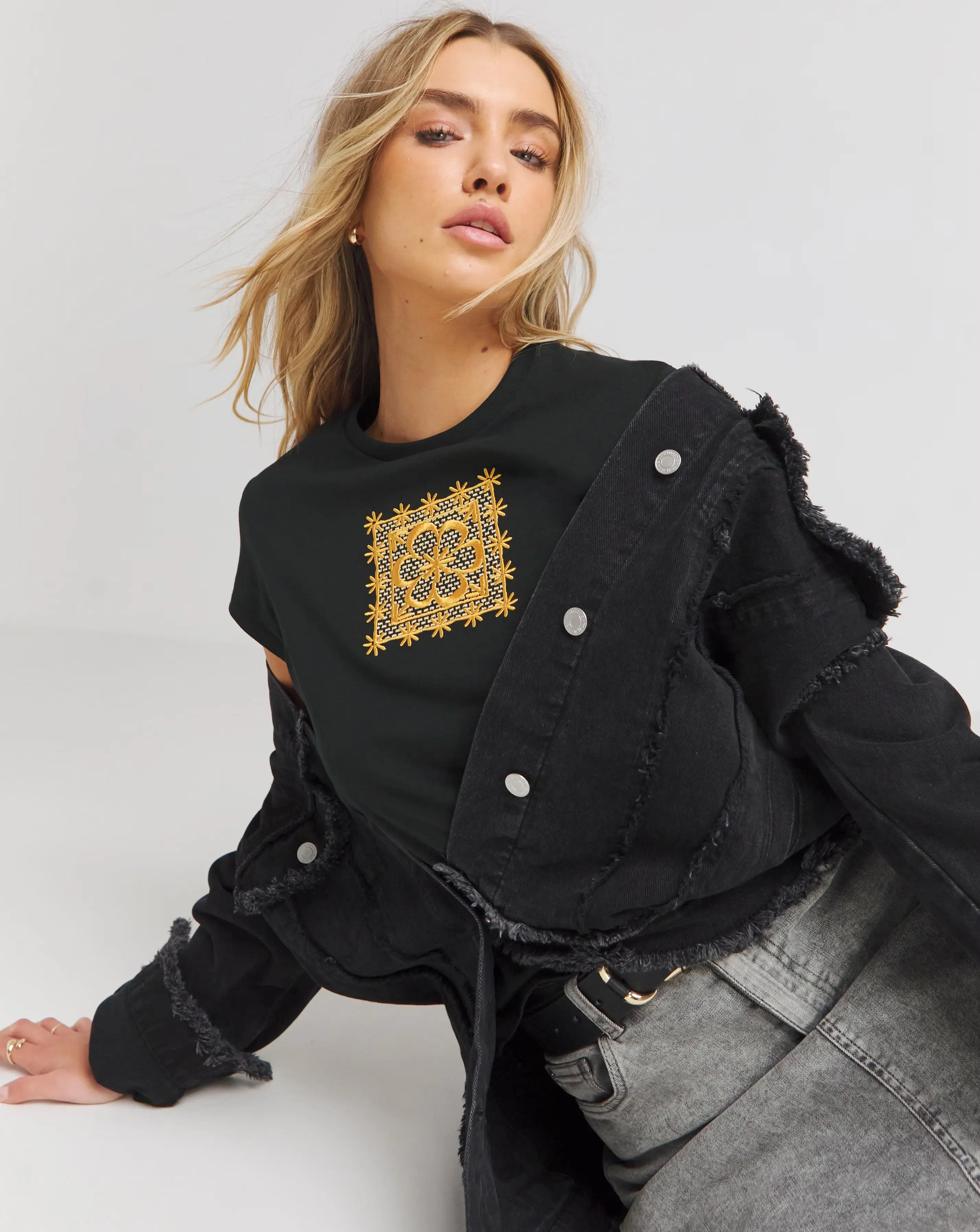27296-black-baby-t-shirt-with-metallic-embroidery-1.webp