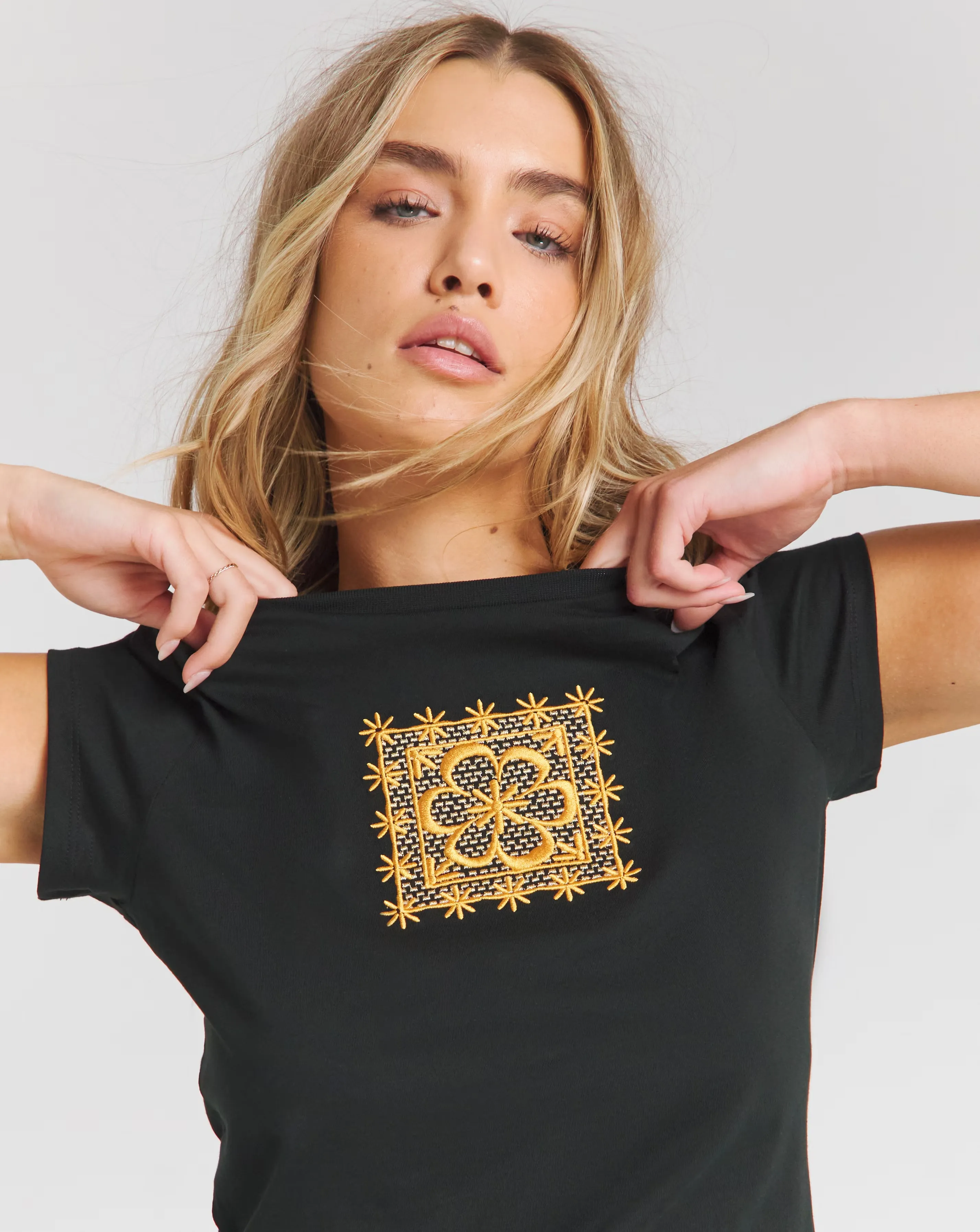27296-black-baby-t-shirt-with-metallic-embroidery-1.webp