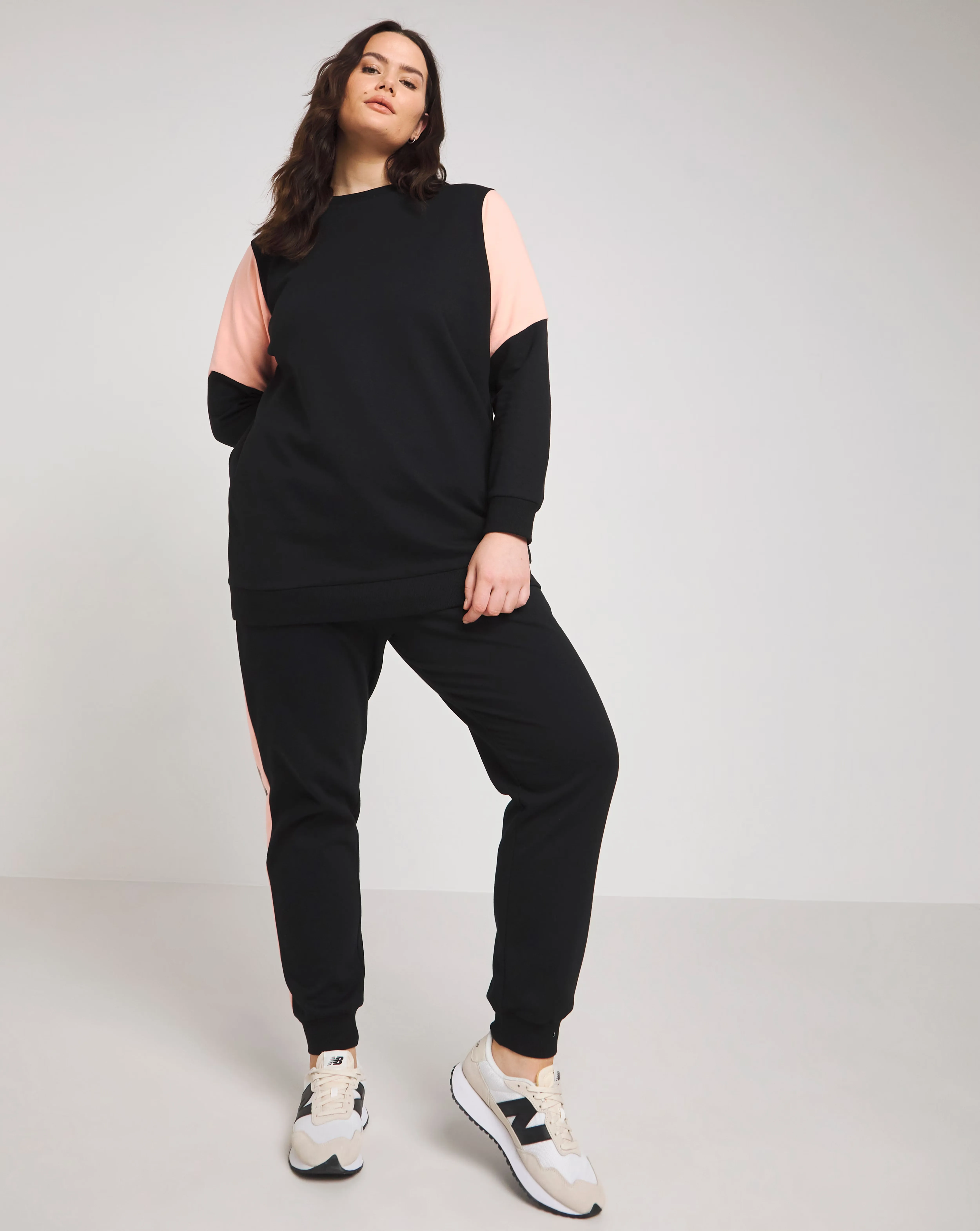 Black and Peach Colourblock Sweatshirt 1 27529-black-and-peach-colourblock-sweatshirt-1.webp