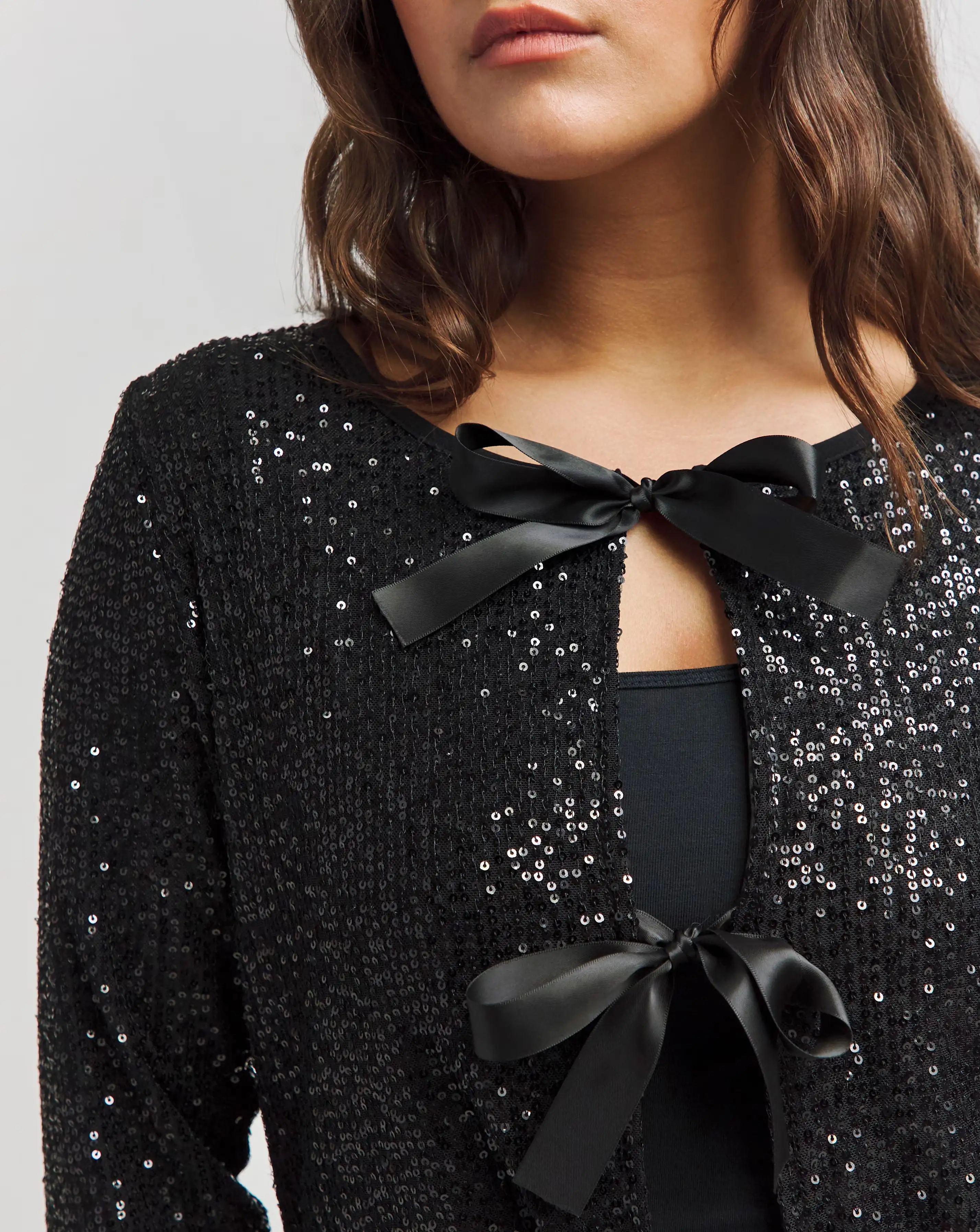 34399-black-linear-sequin-tie-front-cardi-1.jpg