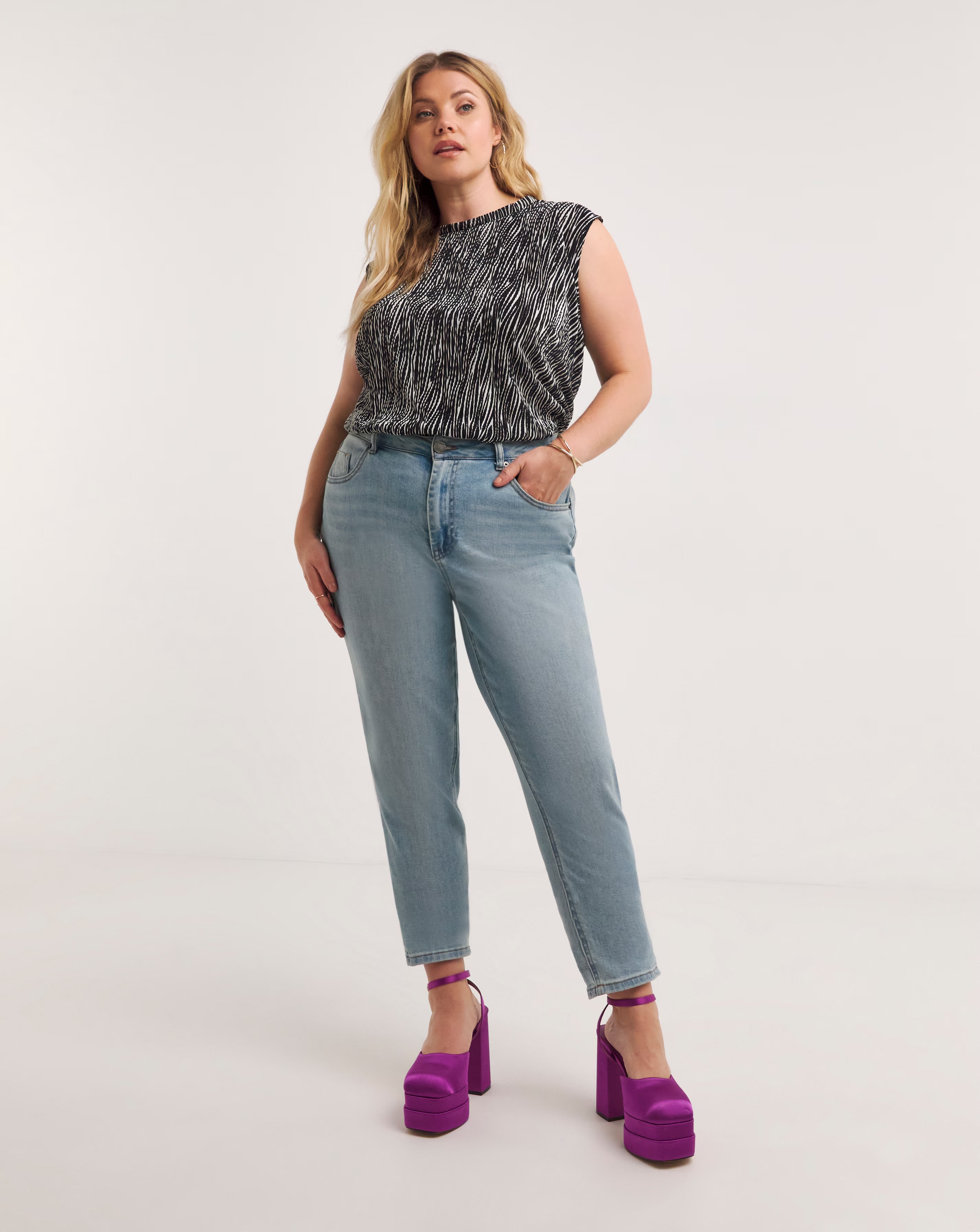 34642-zebra-print-plisse-high-neck-swing-top-1.webp