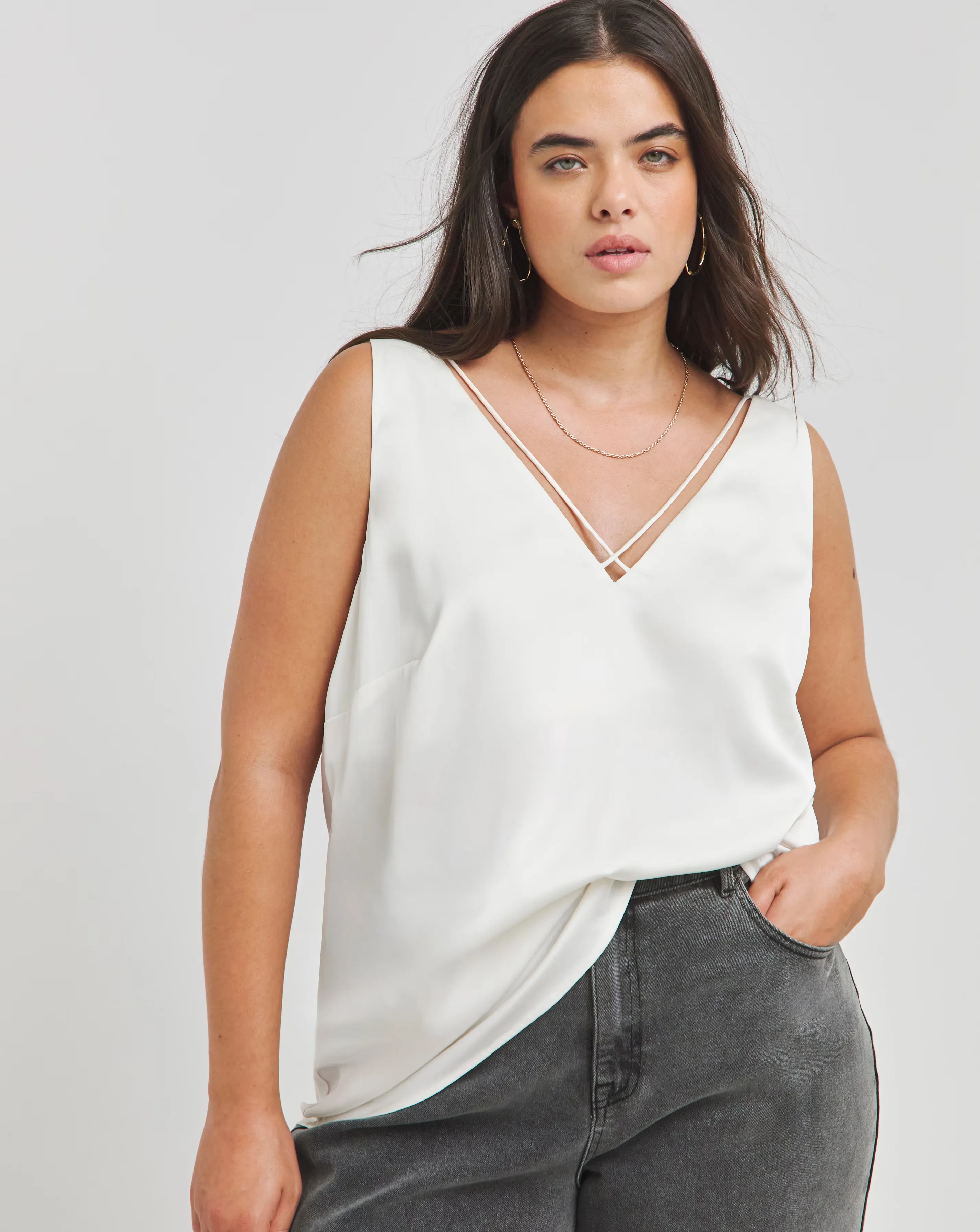 35620-ivory-sleeveless-criss-cross-satin-vest-1.webp