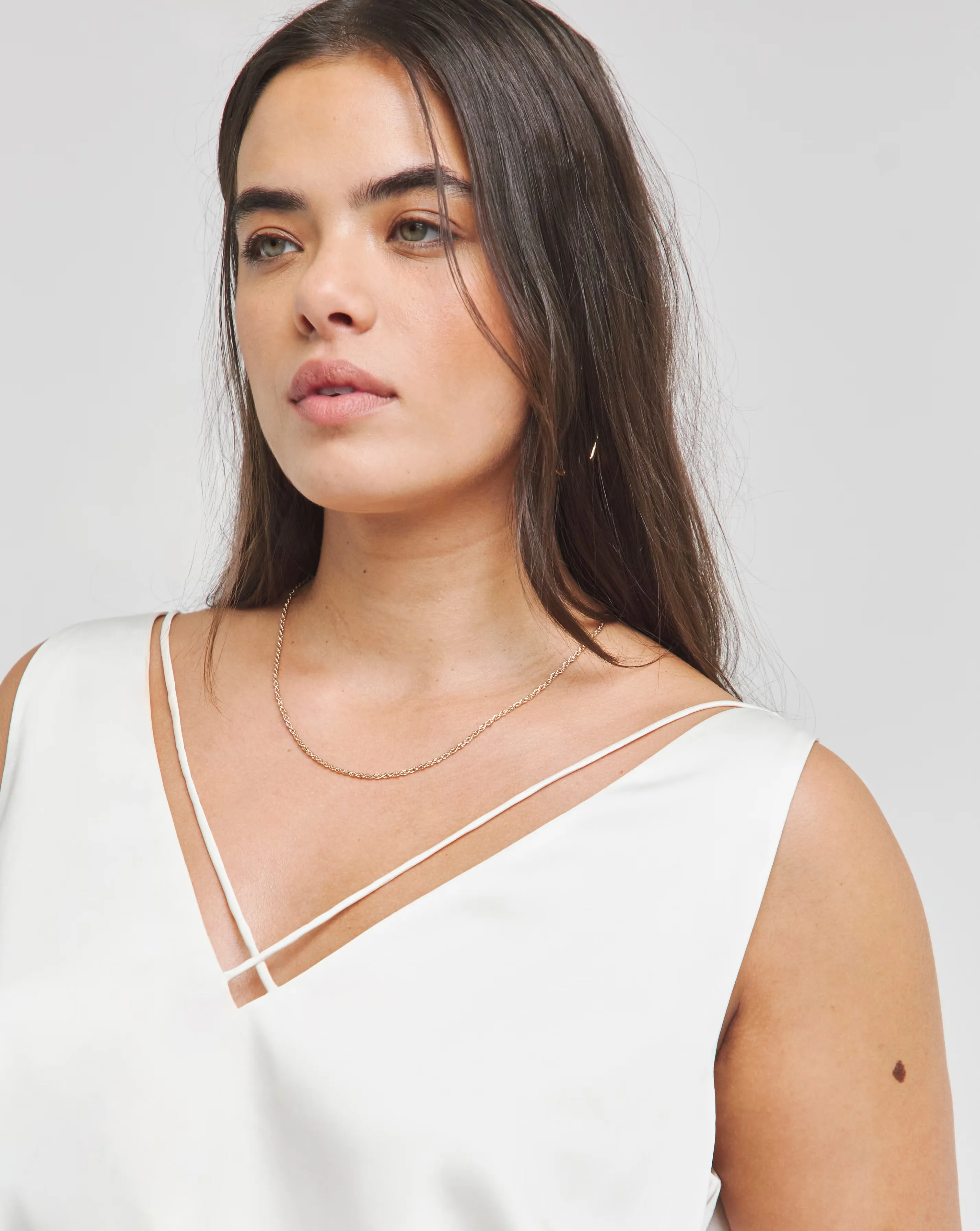 35620-ivory-sleeveless-criss-cross-satin-vest-1.webp