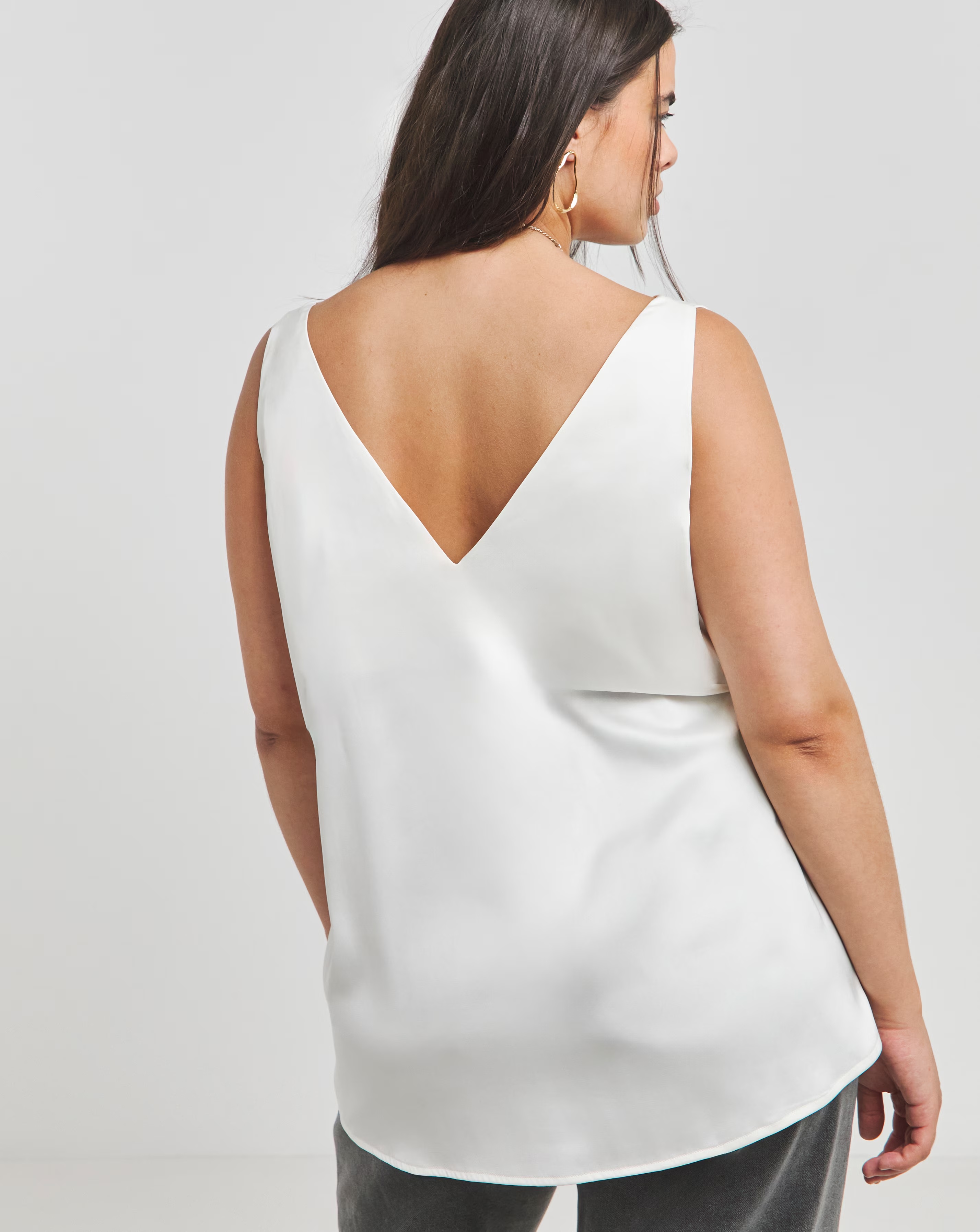 35620-ivory-sleeveless-criss-cross-satin-vest-1.webp