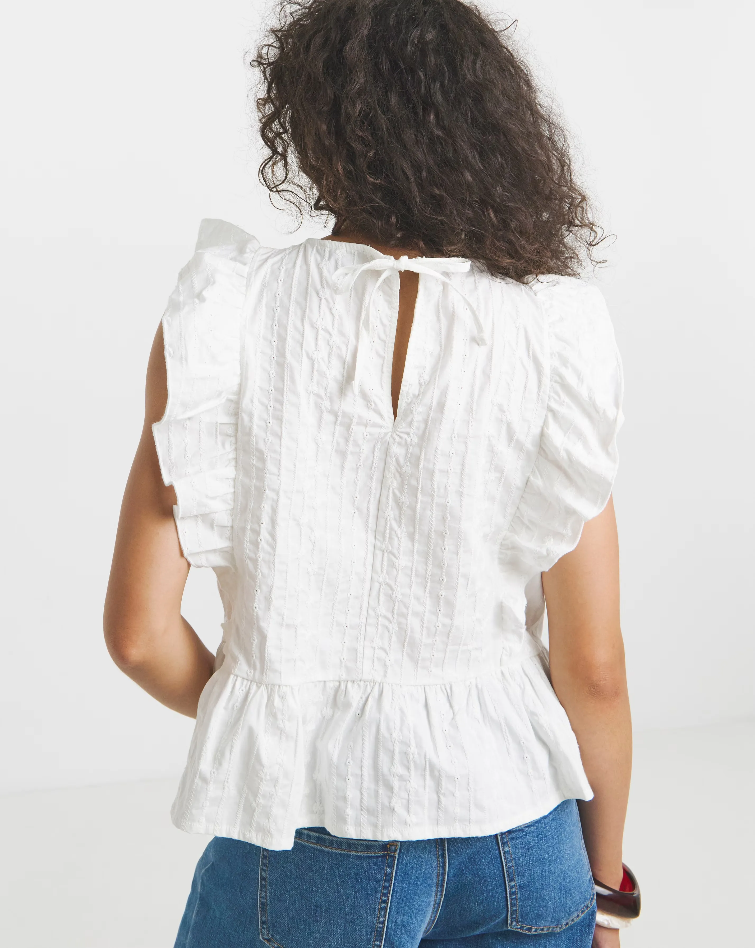 35932-broderie-ruffle-blouse-1.webp