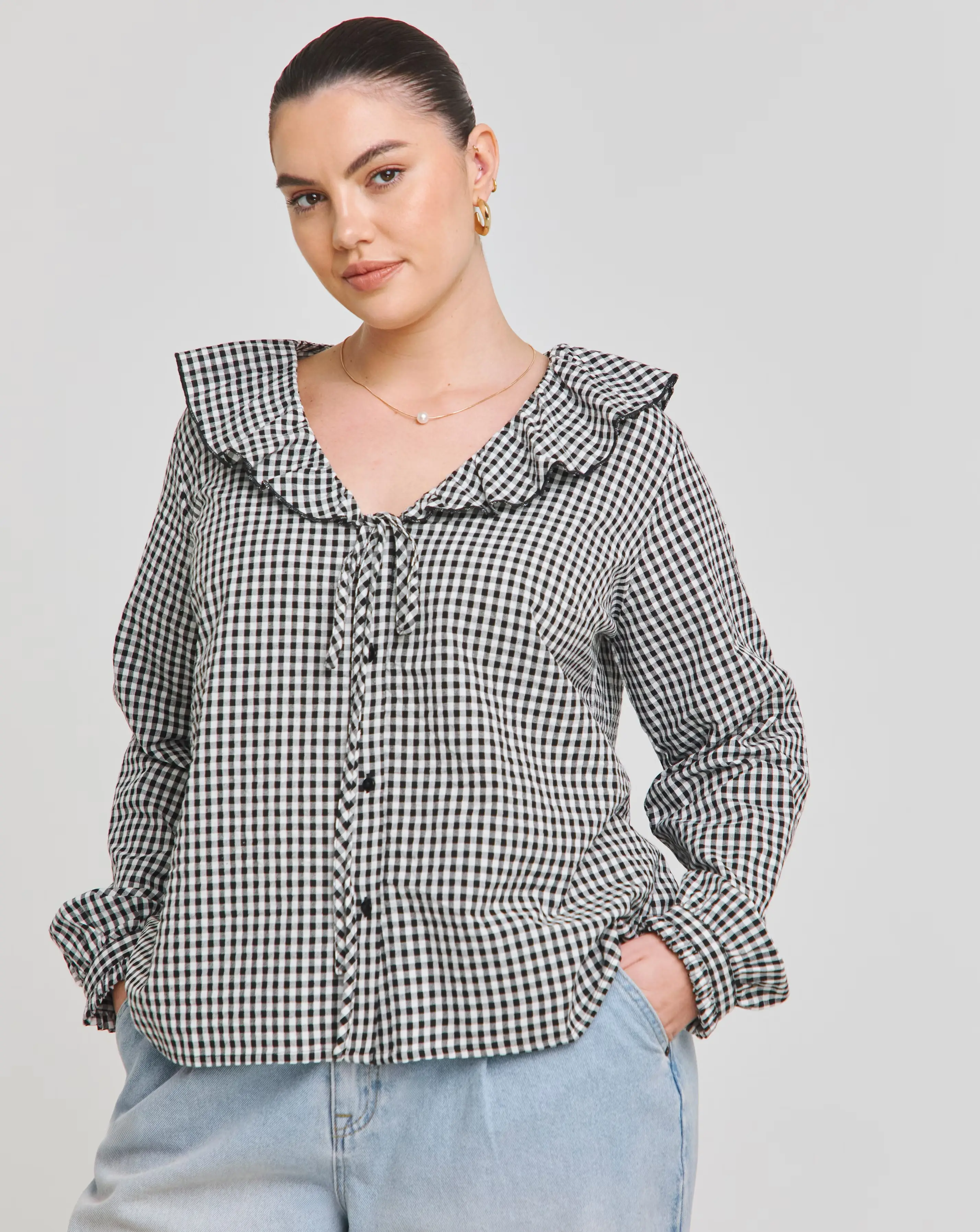 36672-gingham-ruffle-button-through-blouse-1.webp