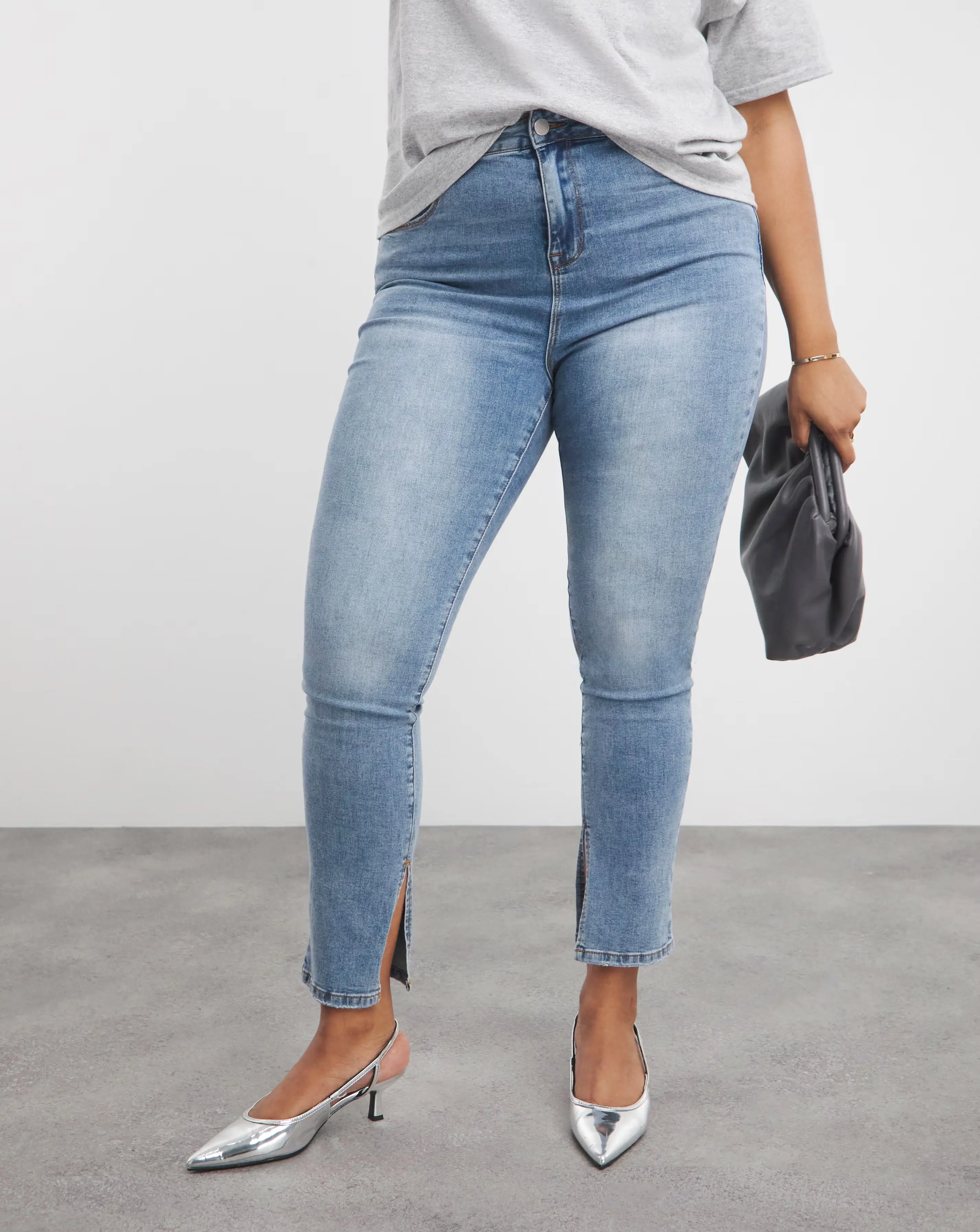 39006-light-blue-side-split-jean-1.webp