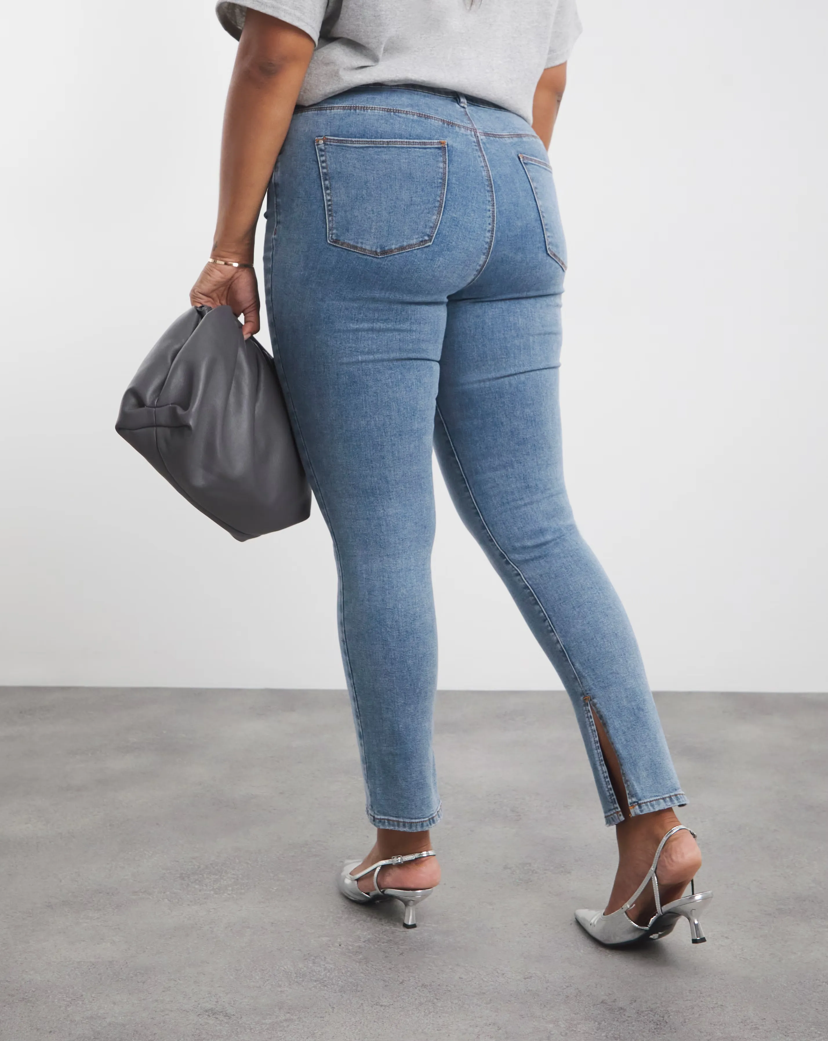 39006-light-blue-side-split-jean-1.webp