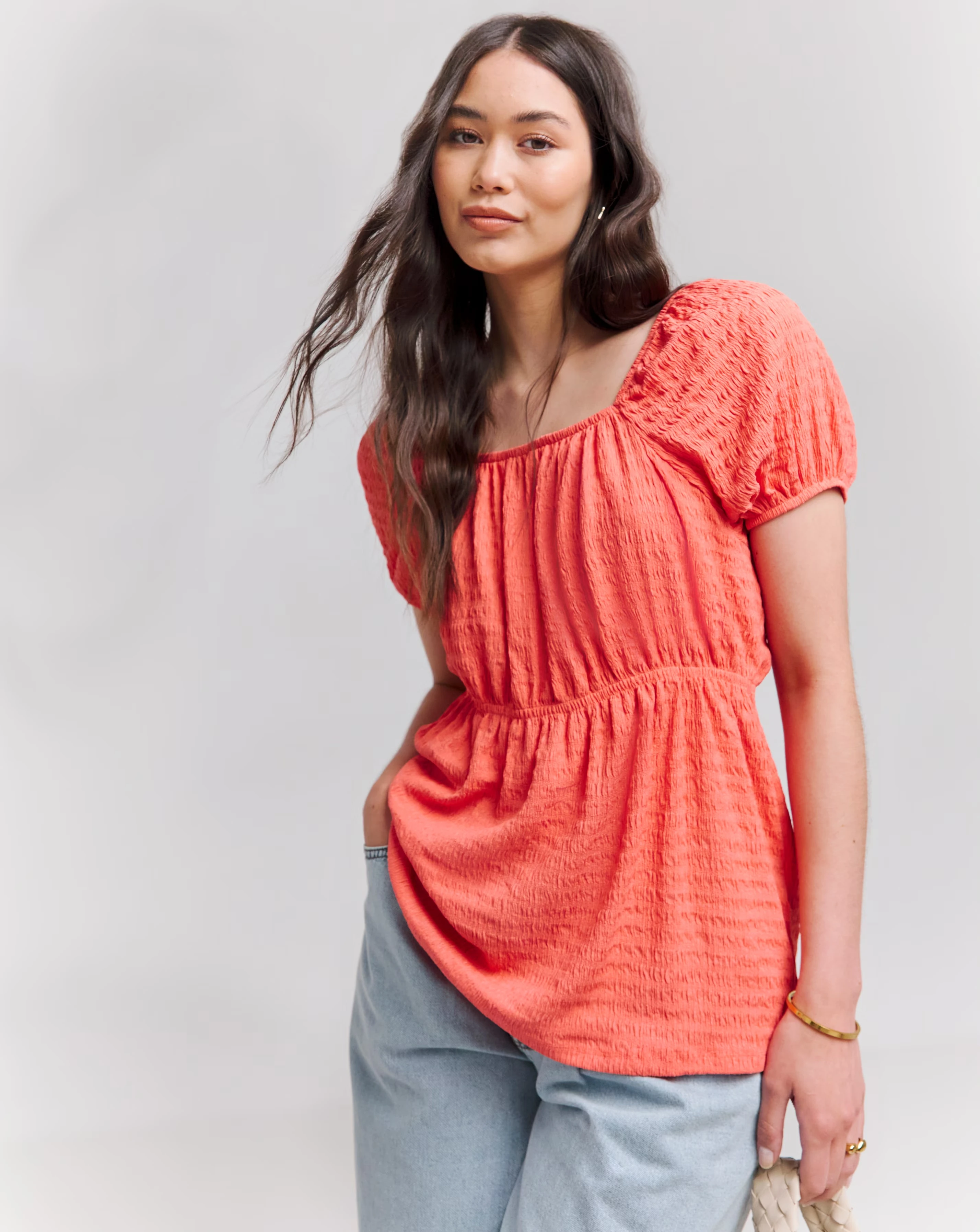 39057-coral-short-sleeve-textured-top-1.webp