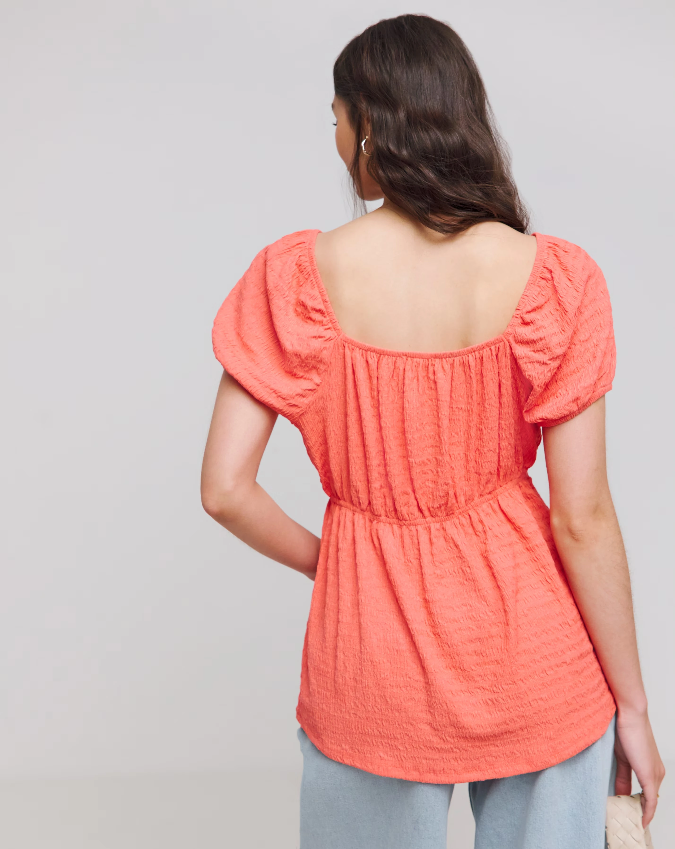 39057-coral-short-sleeve-textured-top-1.webp