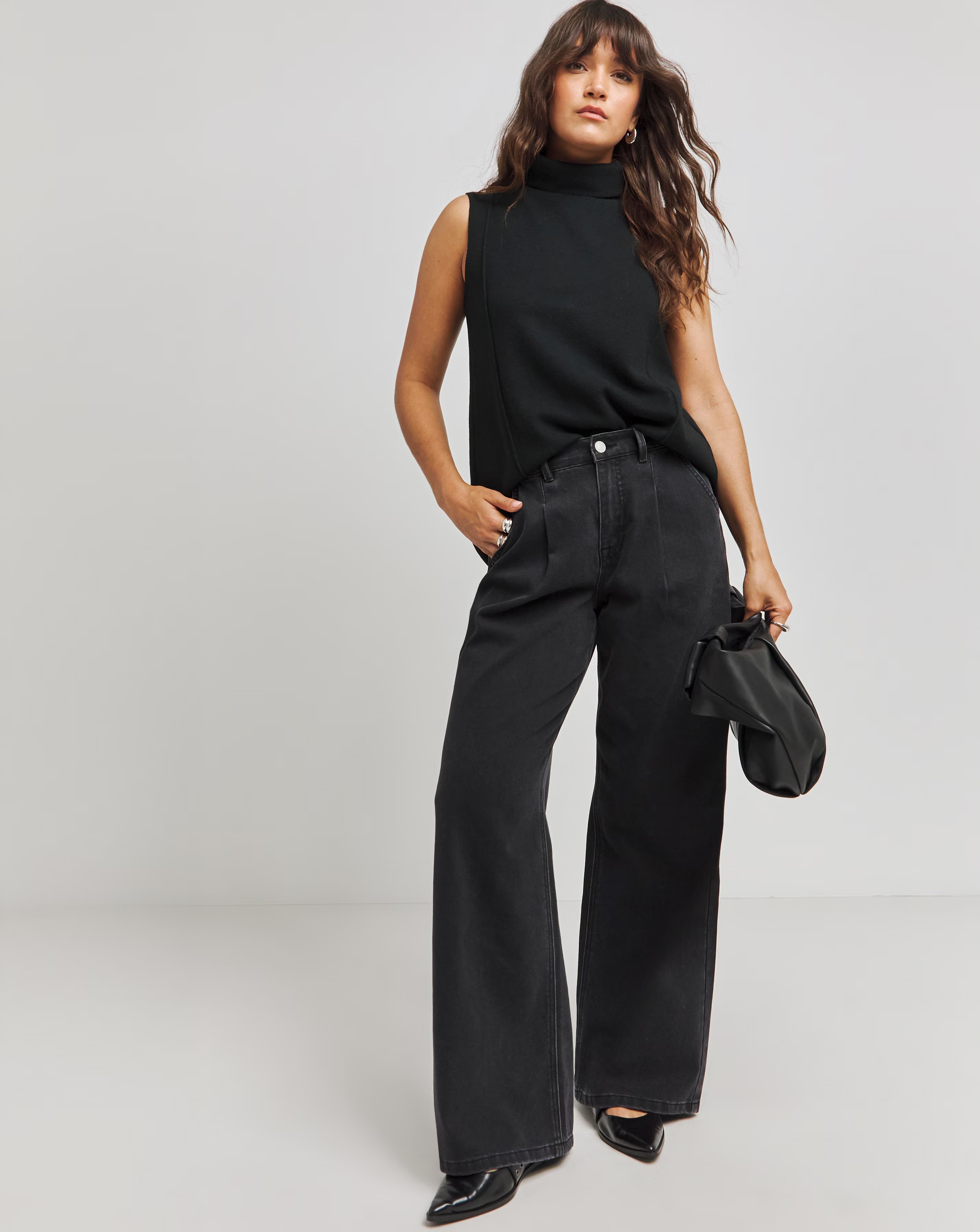 42391-black-cut-amp-sew-roll-neck-vest-1.webp