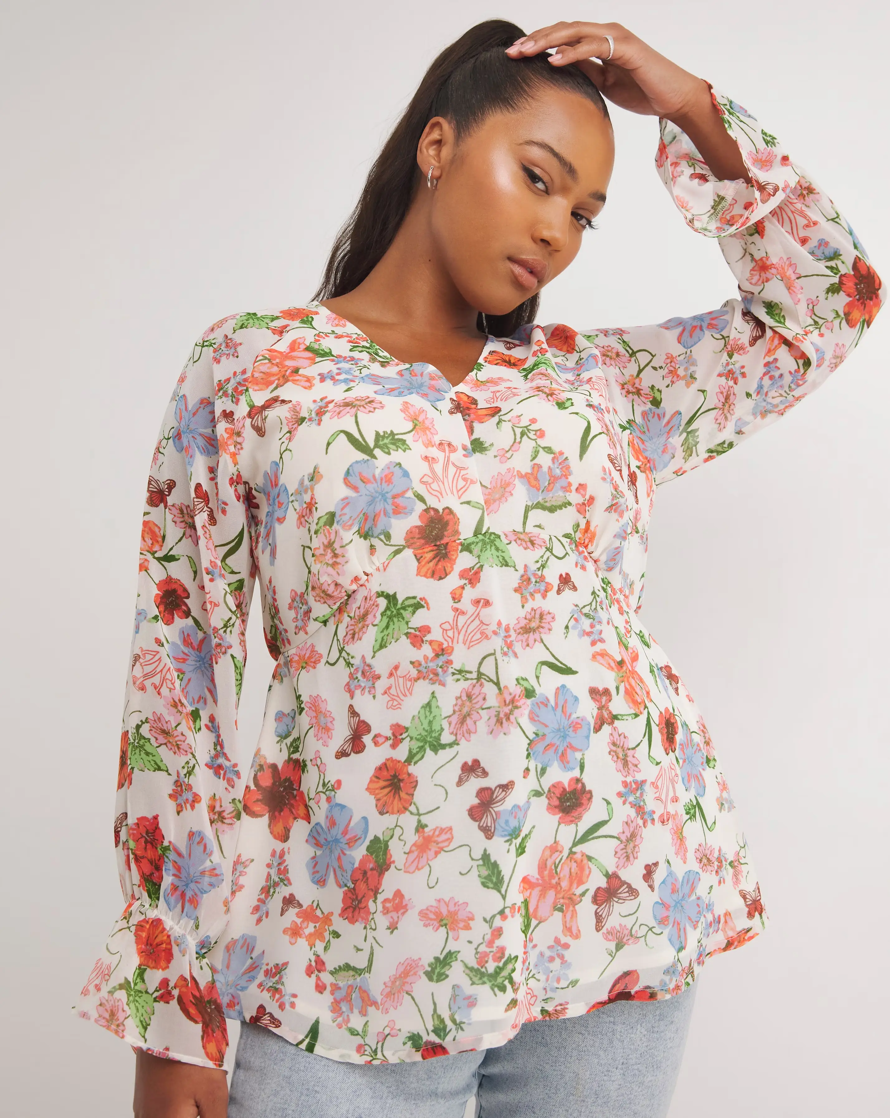 43390-ivory-floral-print-v-neck-long-sleeve-chiffon-blouse-1.webp