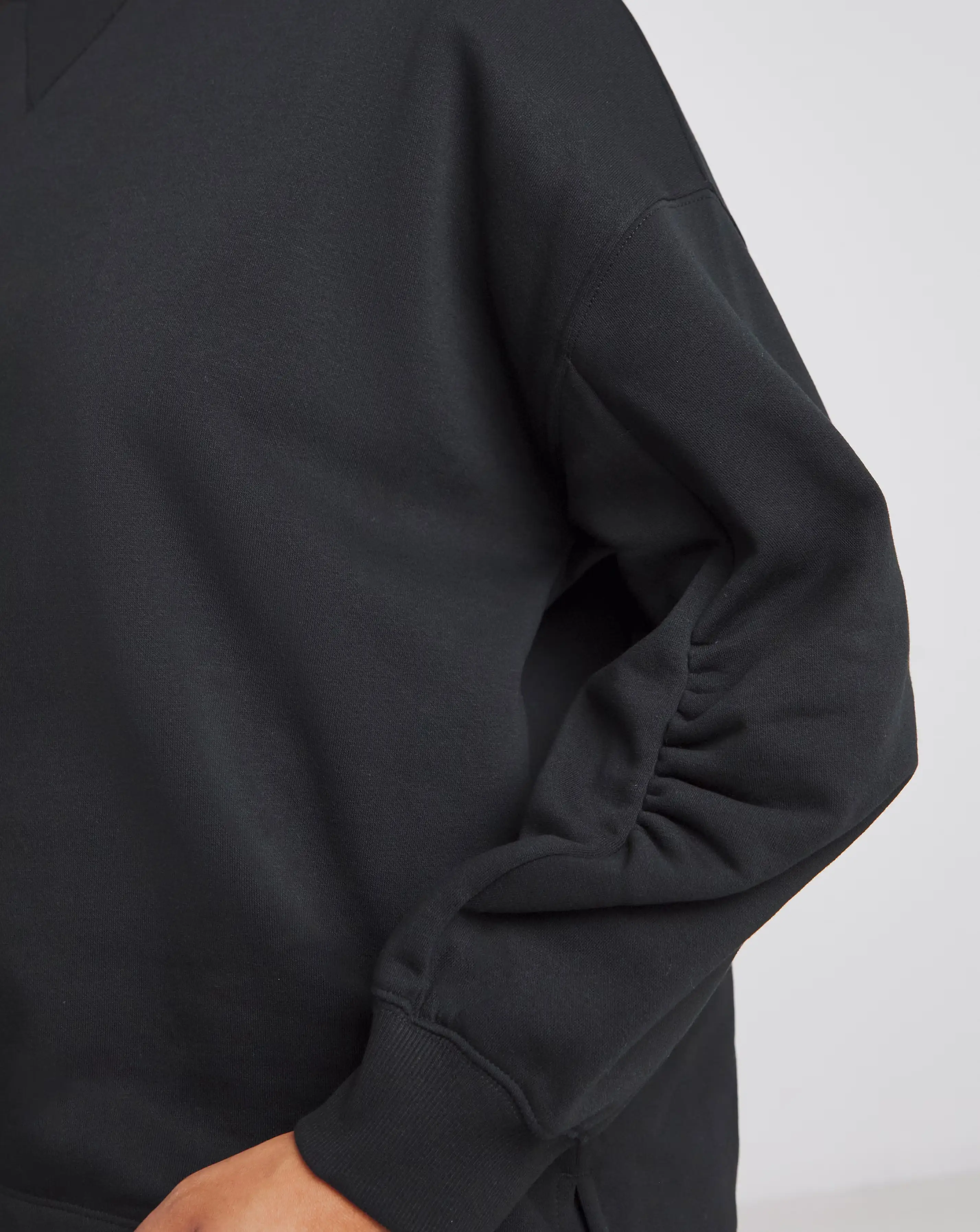 46038-black-curved-hem-dip-back-sweatshirt-1.jpg