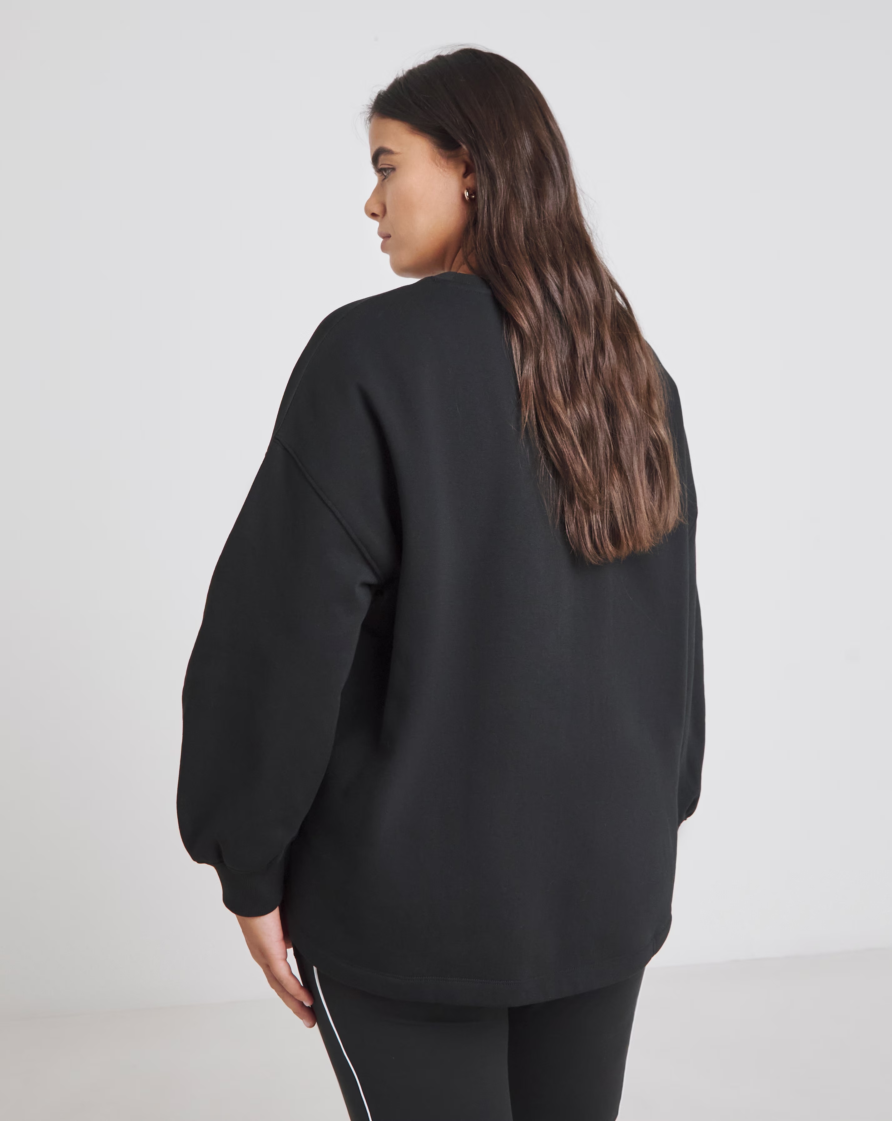 46038-black-curved-hem-dip-back-sweatshirt-1.jpg